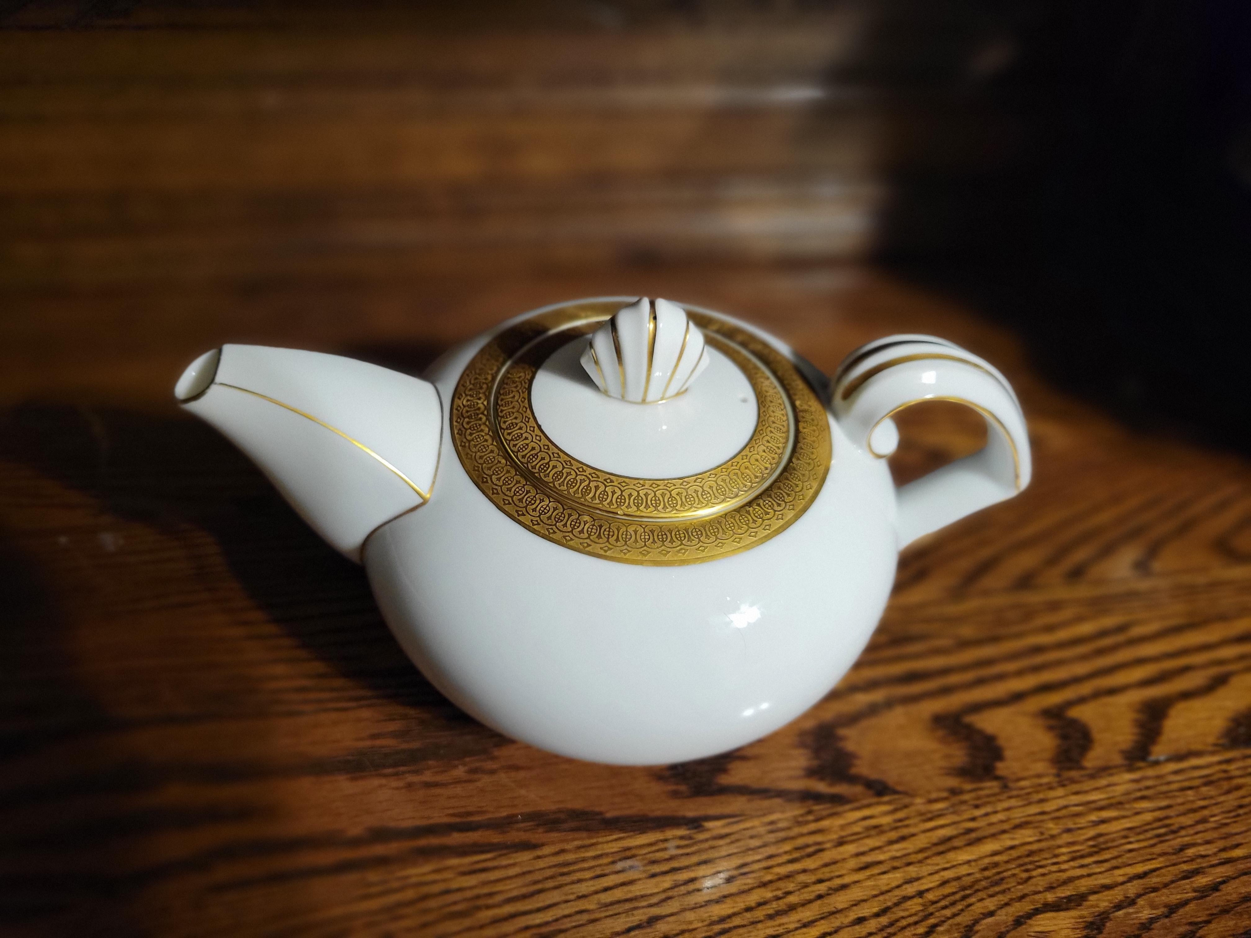 This rare vintage bone china Narumi teapot is about 20