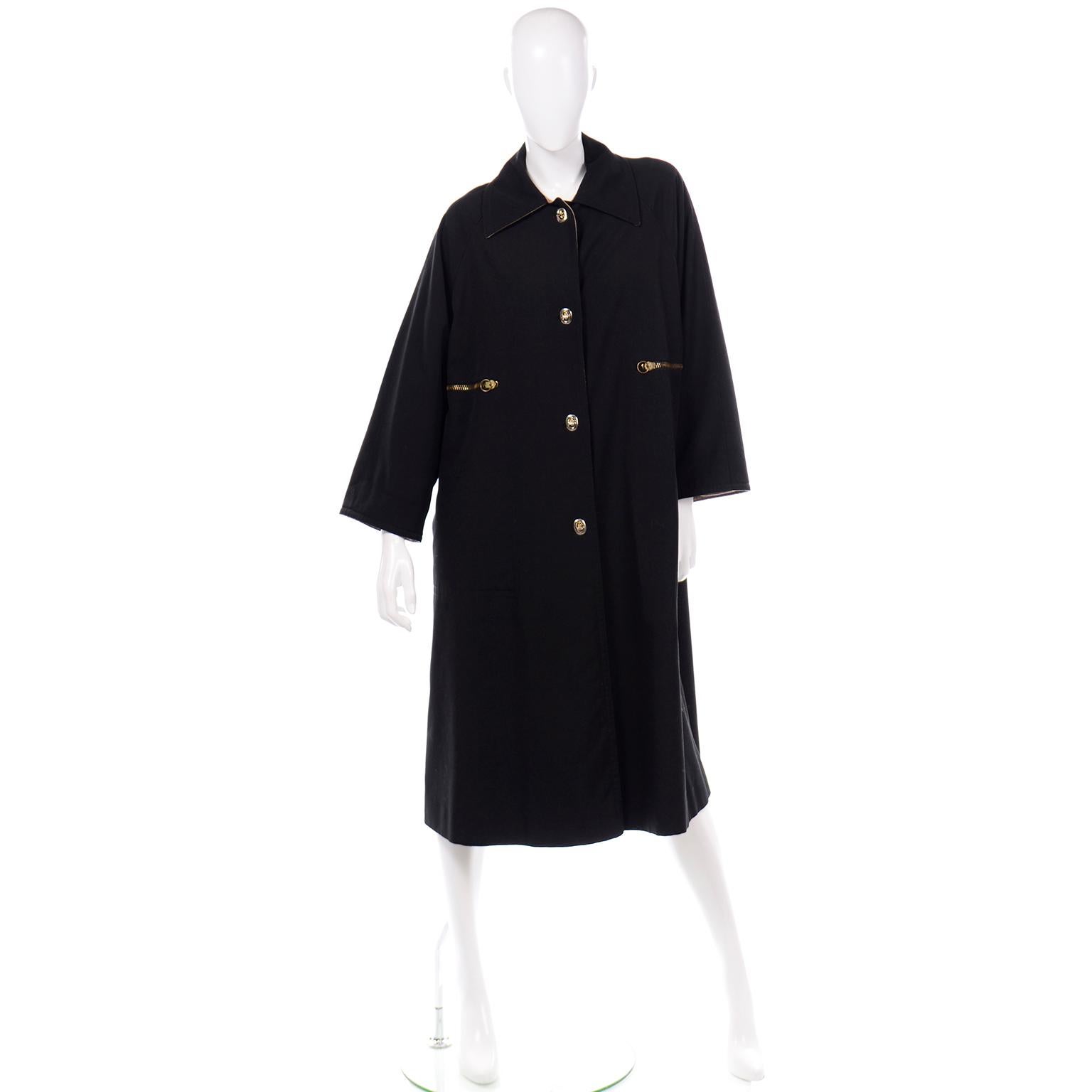 We love vintage Bonnie Cashin clothing and we have sold hundreds of her pieces over the years. Her raincoats always stand the test of time, and this vintage Bonnie Cashin coat would be such a great one to add to your wardrobe! This great black coat
