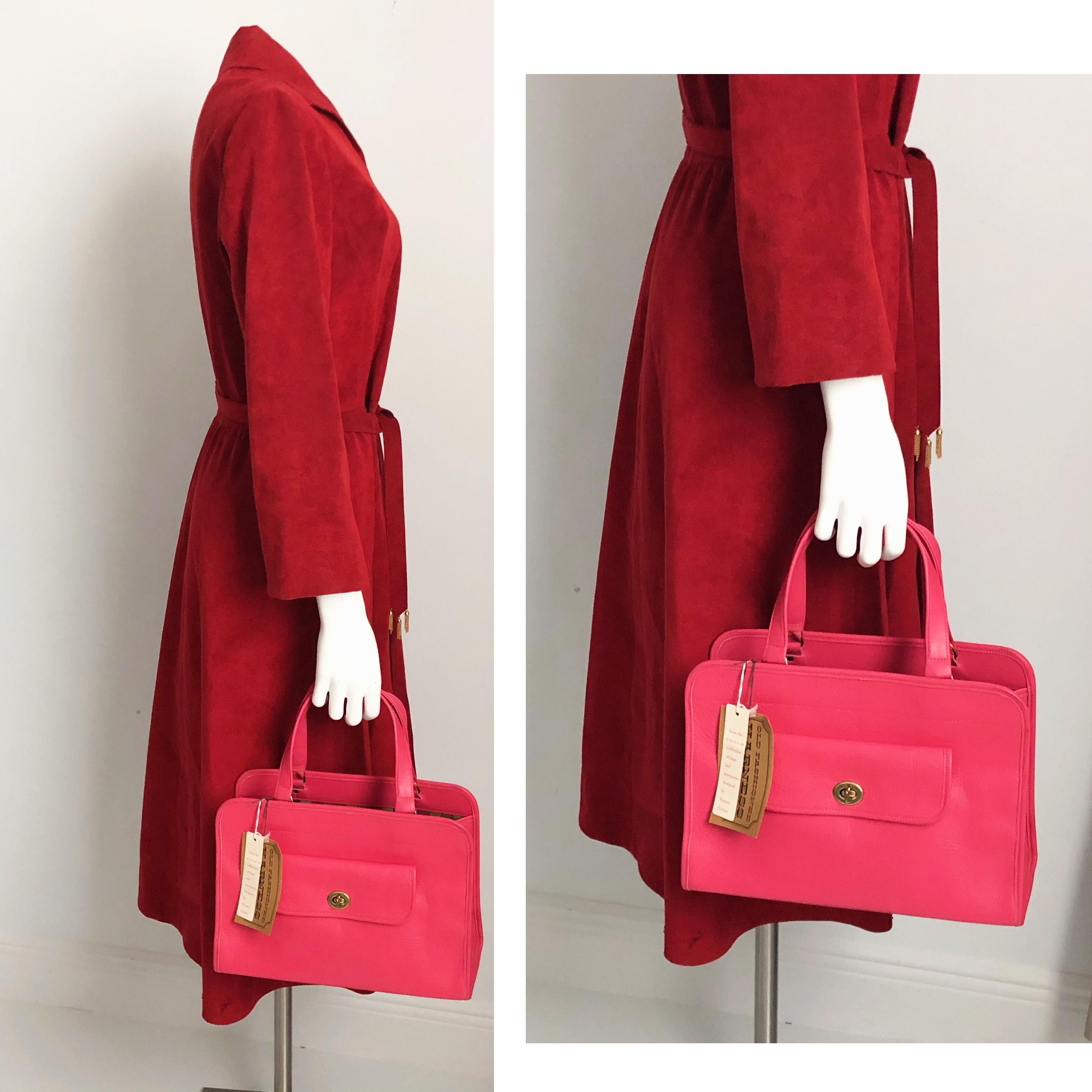 Authentic, vintage RARE Bonnie Cashin Coach Safari Tote Bag in what we believe is Geranium leather (a red toned pink, see pic 11 chart). A UNICORN! From the 60s, with one turn lock slip pocket & interior lined in Bonnie's signature striped fabric