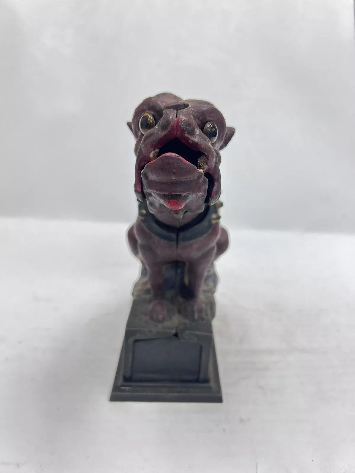 Vintage Book Of Knowledge Cast Iron Bulldog Coin Piggy Bank. Circa Late 20th Century. Measurements: 7.5