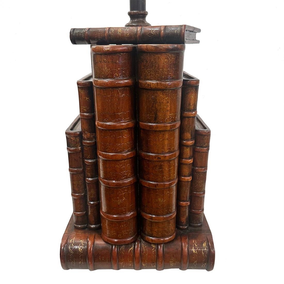 A circa 1970's English bound books wood lamp with gilt details.

Measurements:
Height of body: 17