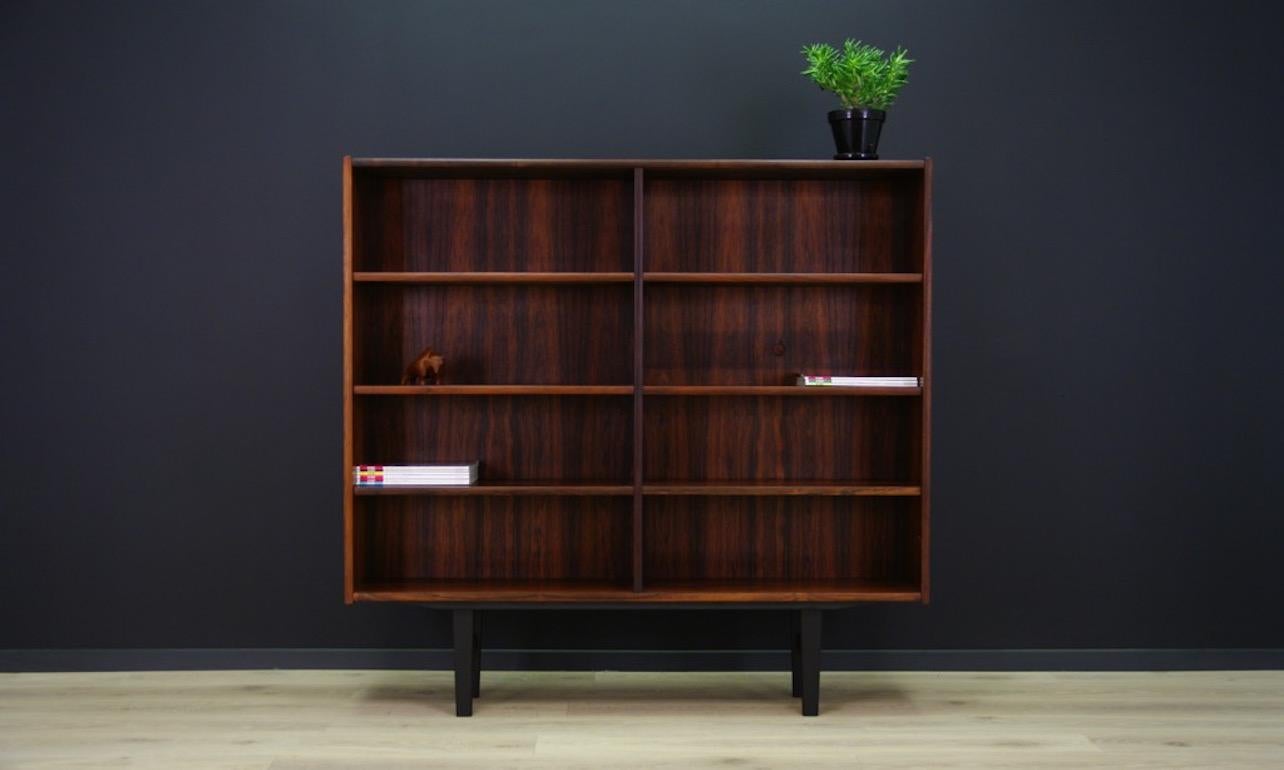 Vintage bookcase from the 1960s-1970s, Minimalist form. Beautiful straight line, Danish design. Bookcase finished with rosewood veneer. Preserved in good condition (minor scratches and upholstery), directly for use.

Dimensions: Height 138.5 cm,