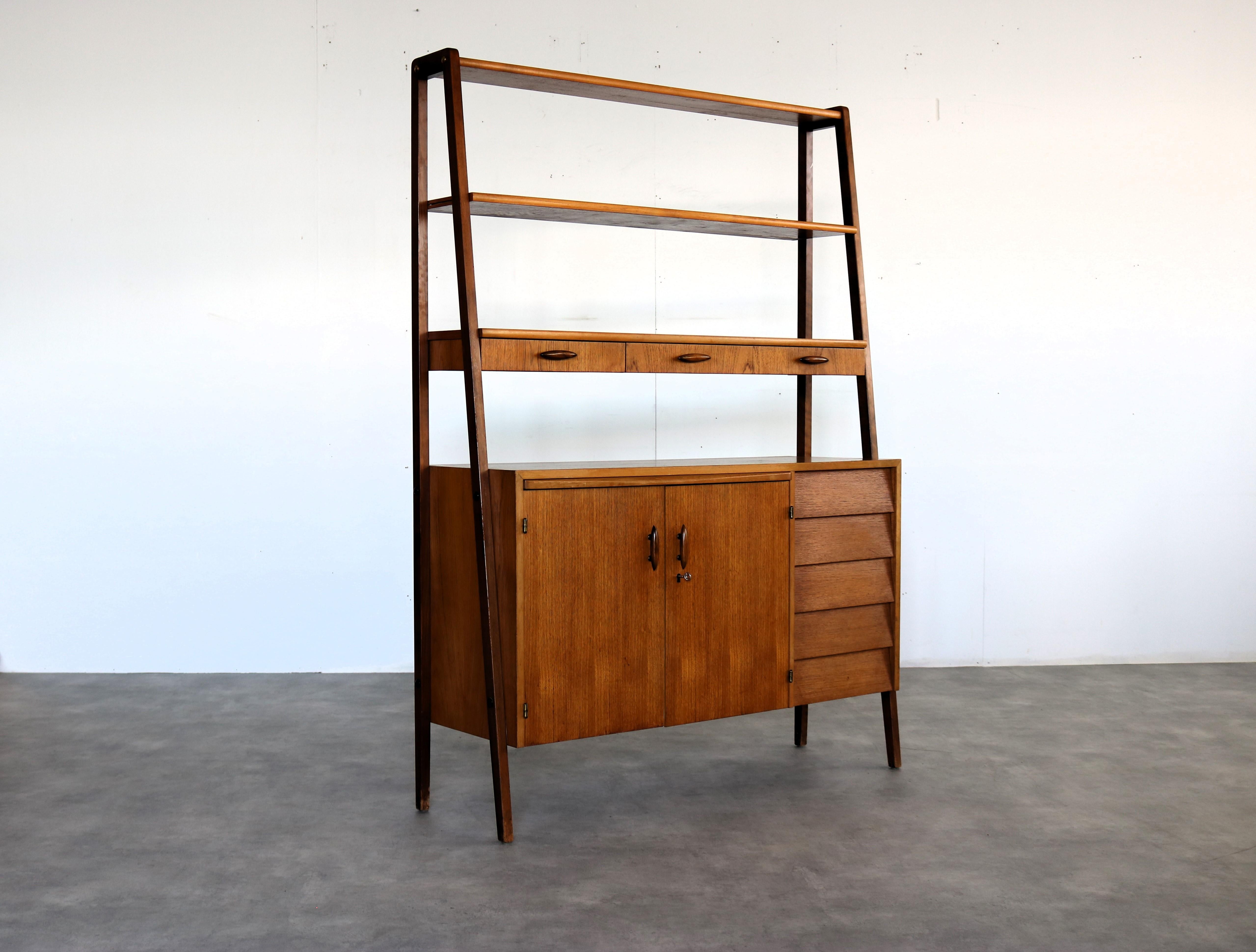 vintage bookcase  secretary  cupboard  teak

period  60's
design  unknown  Sweden
condition  good  light signs of use
size  175 x 125 x 42 (hxwxd)

details  teak; stretch sheet;

article number  2482