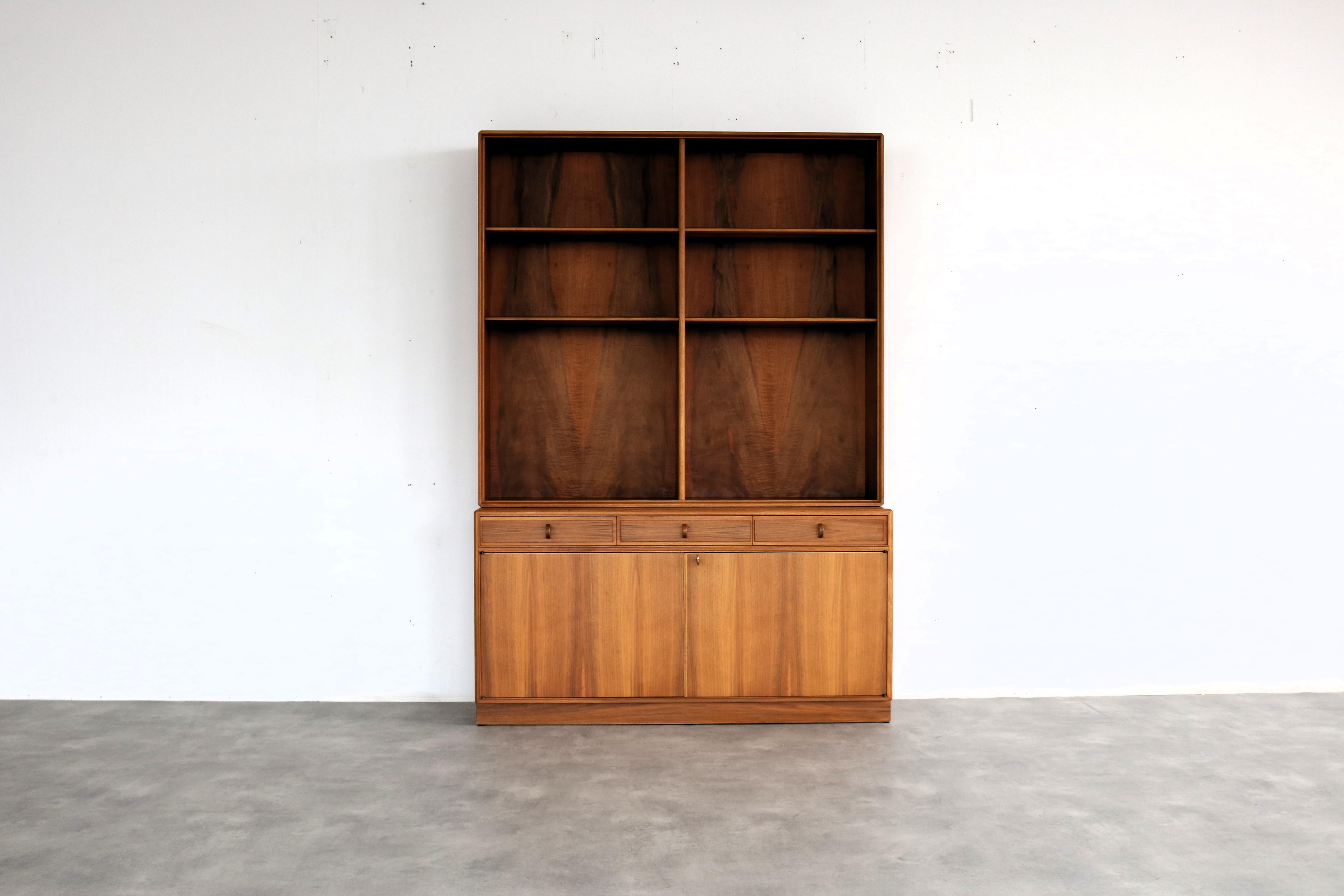 vintage bookcase | wall cupboard | 60s | Bodafors

period | 60's
design | Bodafors | Sweden
condition | good | light signs of use
size | 188 x 130 x 40 (hxwxd)

details | teak;

article number | 2130