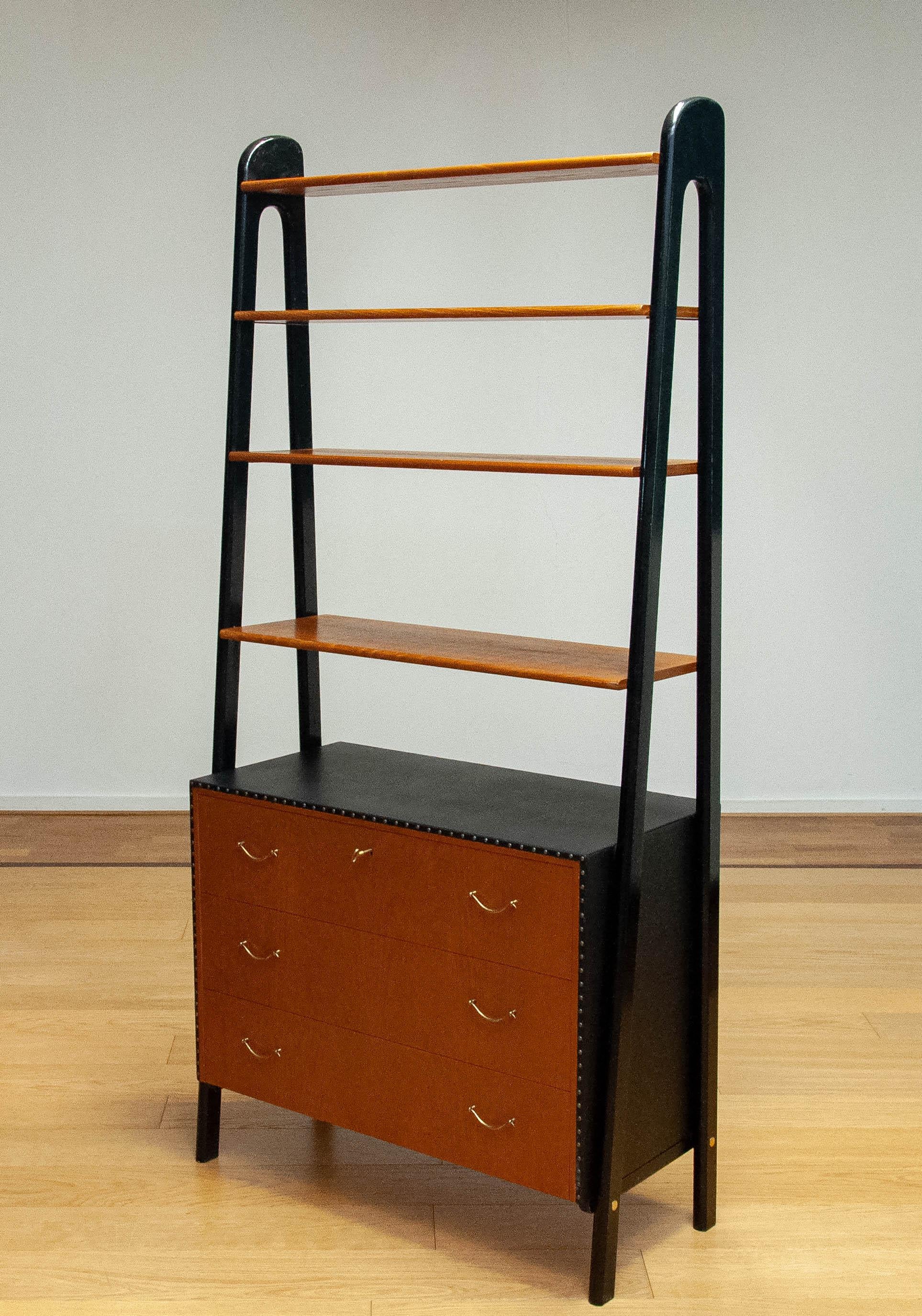 Mid-20th Century Vintage Bookcase With Black Lacquered Stands, Teak Drawers By Bertil Fridhagen