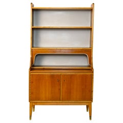 Vintage bookcase with pull-out shelf