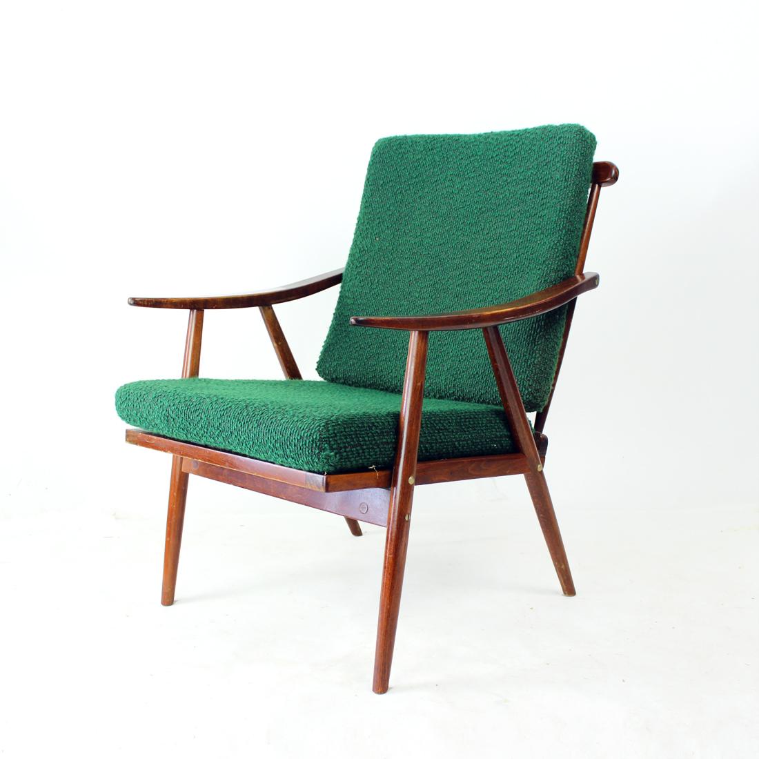 Iconic Boomerang armchair produced by TON company in 1960s in Czechoslovakia. The name comes from the curved armrests. The chair is produced as elegant and airy design with light, but strong construction. The seat and backrest cushion are in vintage