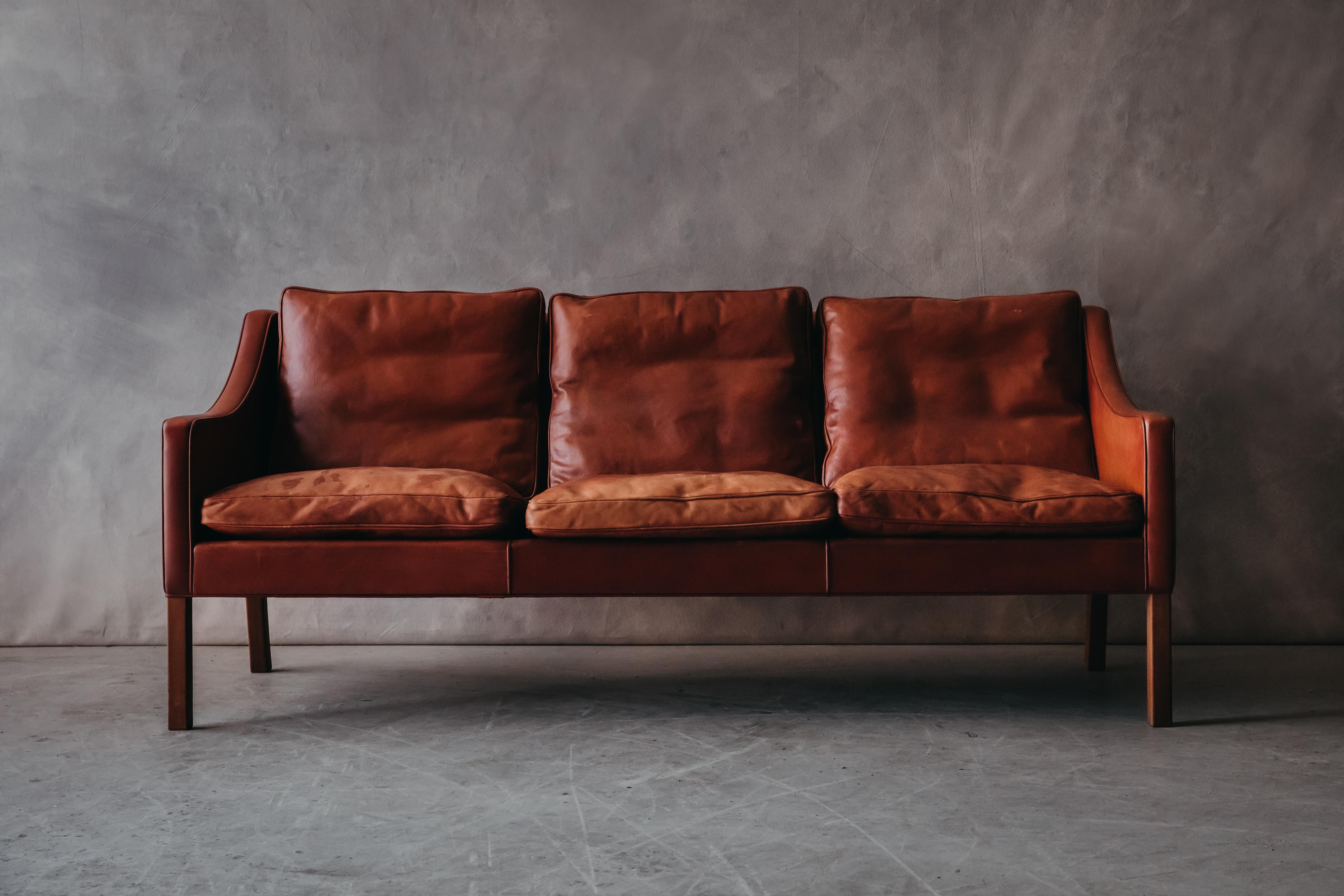 Vintage Borge Mogensen Sofa, Model 2209, from Denmark, circa 1980. Original cognac leather with an amazing patina and wear. Very comfortable.