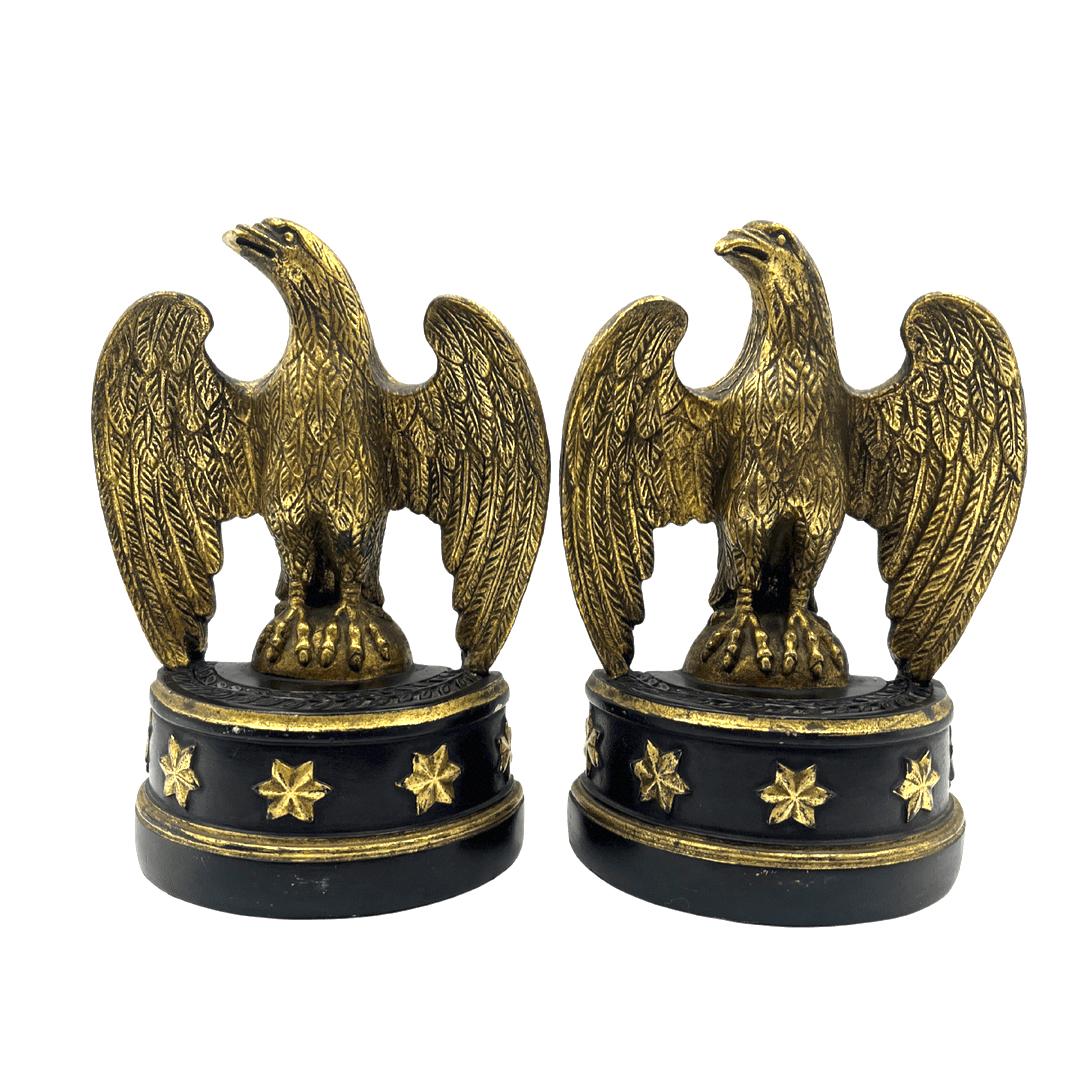 Presented is a pair of vintage plaster cast American Eagle bookends. Designed in a Federal style, with black base and five gold stars by Borghese of Italy. This beautiful bookend pair is the same style as seen in photos of John F. Kennedy’s Senate