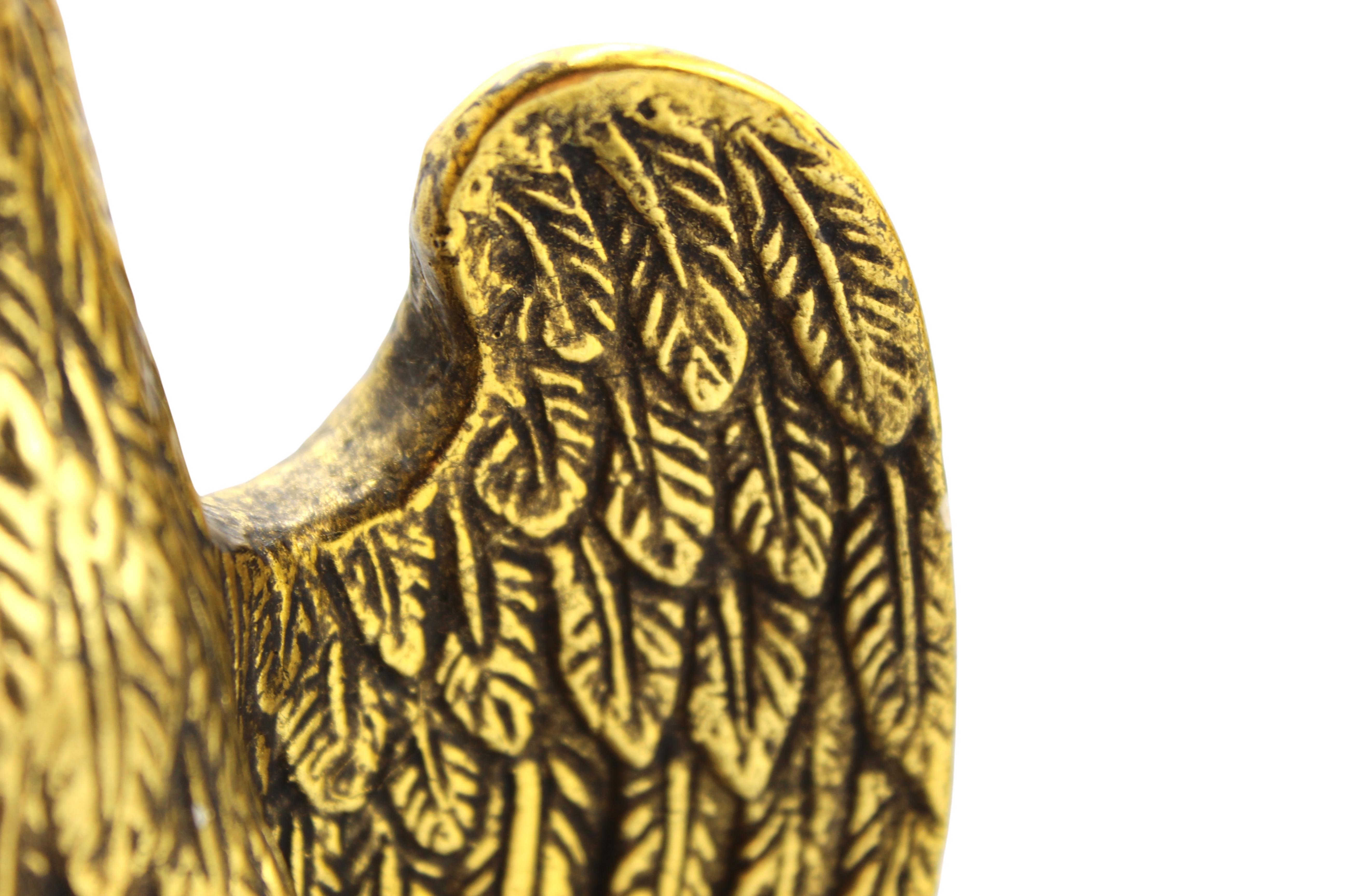 Intonaco Reggilibri Aquila Borghese d'epoca con base nera in vendita