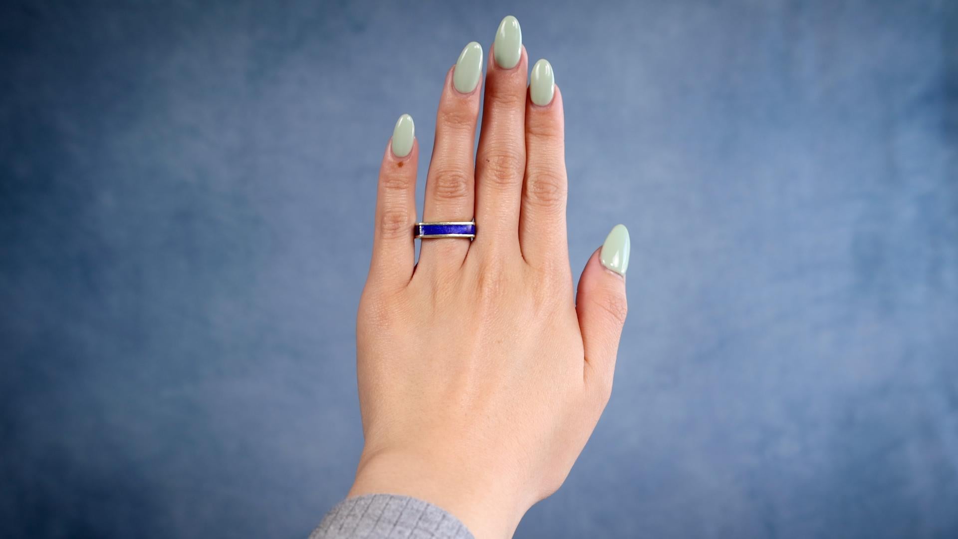 One Vintage Boris LeBeau Blue Enamel 14k Yellow Gold Ring. Crafted in blue enamel and 14 karat yellow gold signed Boris with purity mark. Circa 1970. The ring is a size 7 and may not be resized.

About this Item: Indulge in timeless elegance with