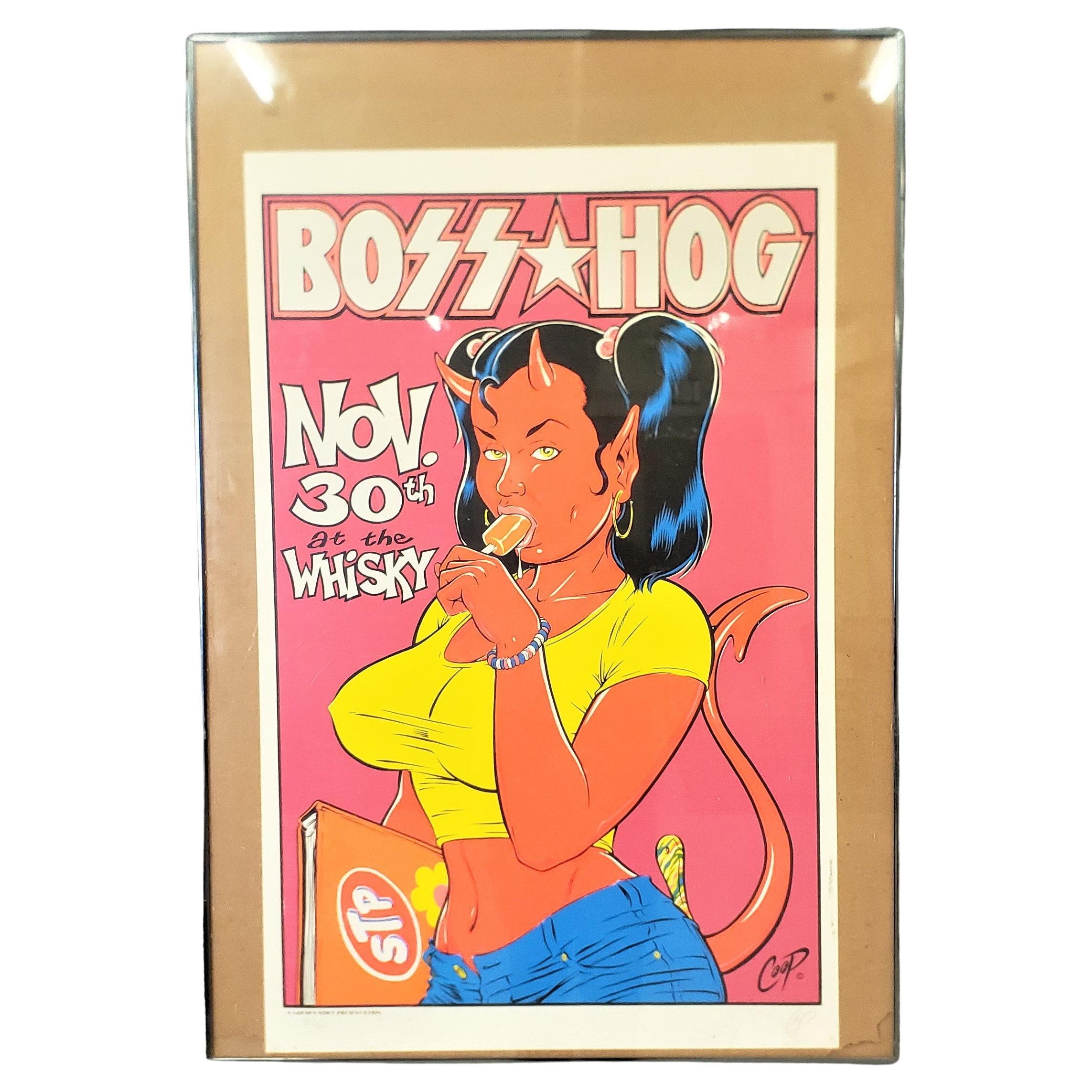 This vintge limited edition concert poster was done by Coop of the United States in approximately 1990 in a modern cartoon style. The poster is likely done by silkscreen on paper and is a poster done for the band Boss Hog playing at the Whiskey A