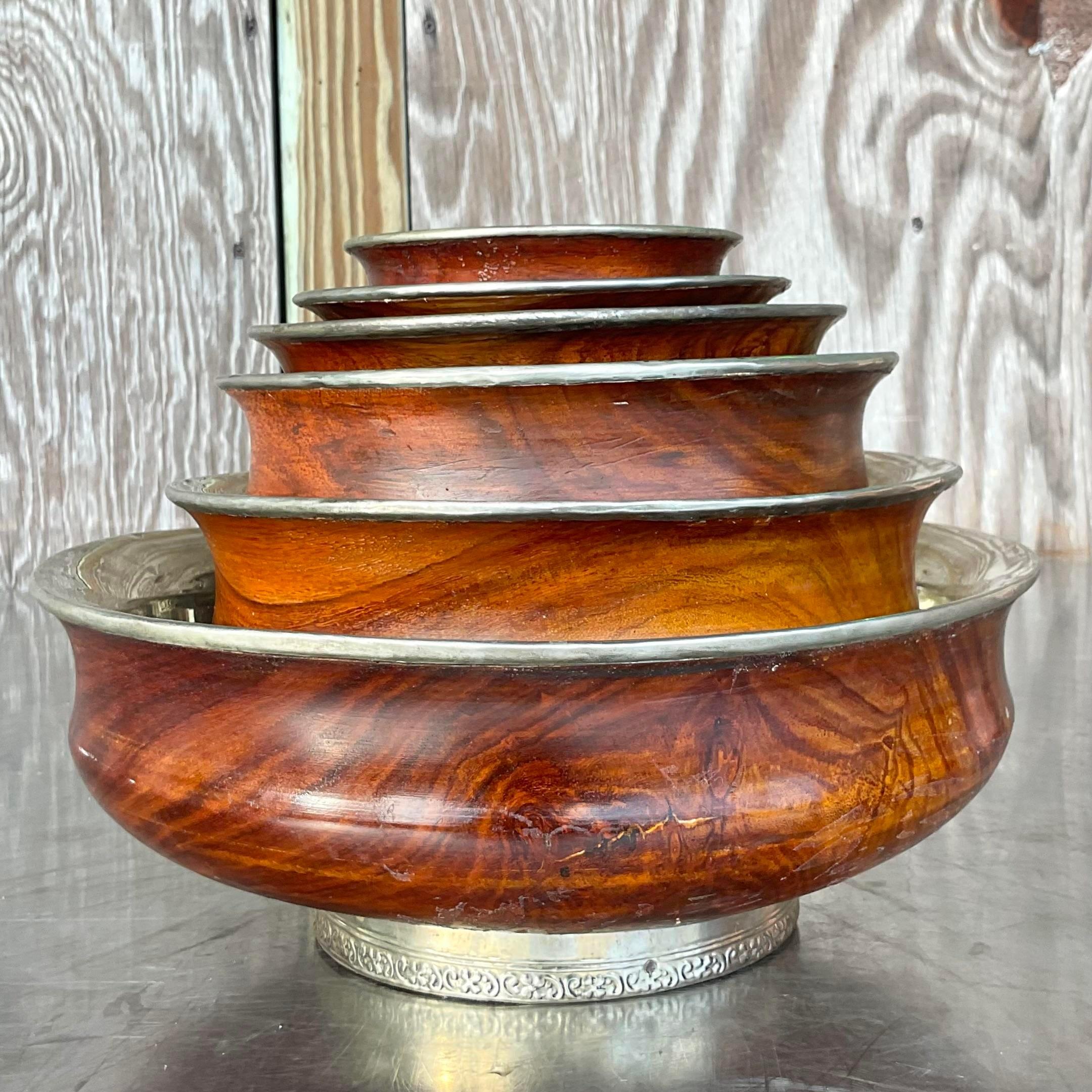 A stunning set of five vintage stacking bowls. A chic team bowl with a polished nickel interior. Acquired from a Palm Beach estate.
Bowl 1 - 7.75x7.75x3.25
Bowl 2 - 6.75x6.75x3
Bowl 3 - 6x6x2.25
Bowl 4 - 5x5x1.75
Bowl 5 - 4x4x1.75 