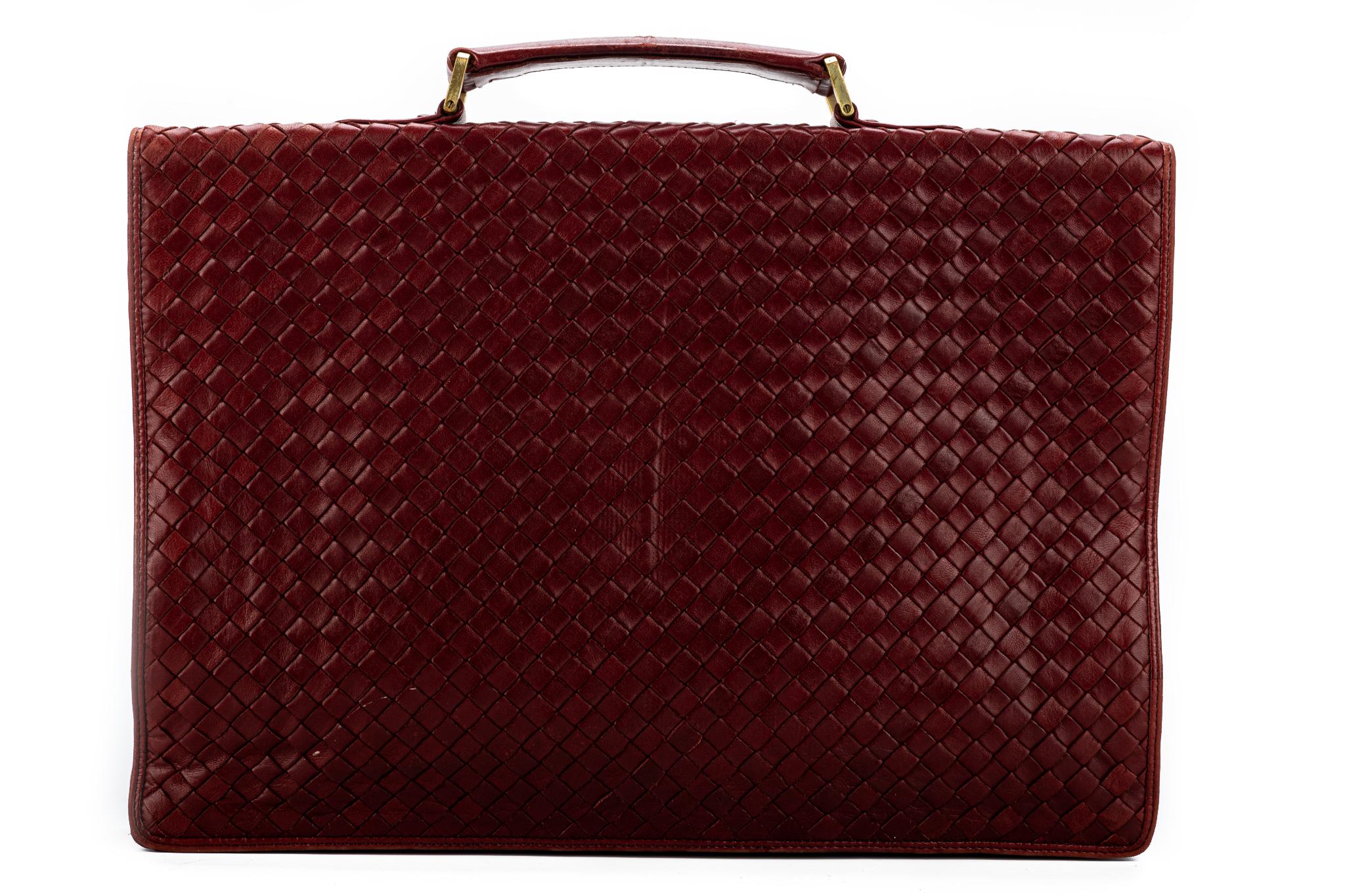 Used Briefcase NO brand shown,18x13x4.5 Leather in&out dark Burgundy w/warra 