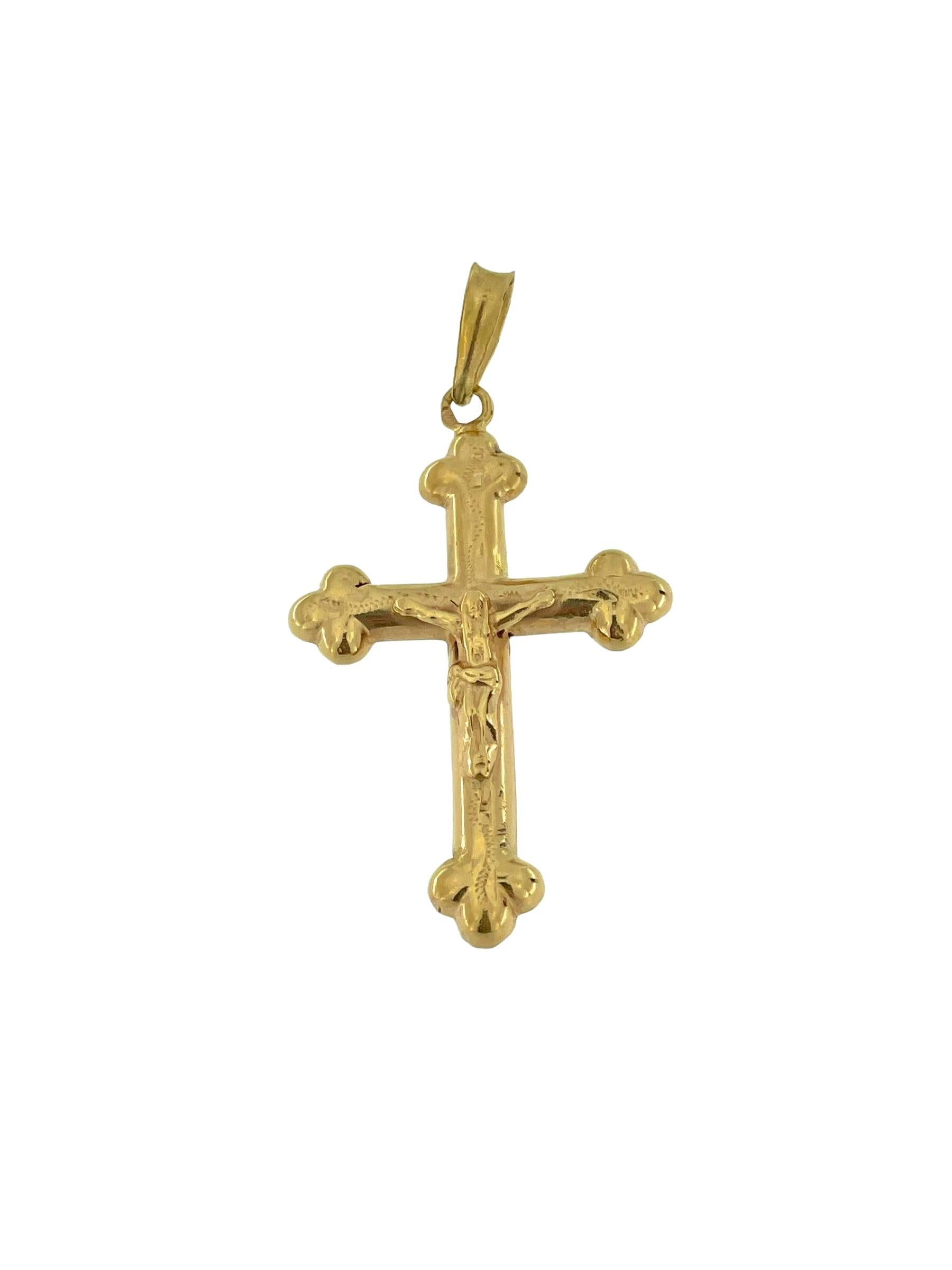 Das Vintage Bottony Kruzifix aus Gelbgold ist ein wunderschönes und zeitloses religiöses Schmuckstück, das für viele eine große Bedeutung hat. Dieses Kruzifix aus 18-karätigem Gelbgold im Vintage-Design besticht durch seine filigranen Details, die