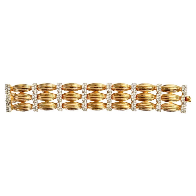 Vintage Boucher Bracelet with Pave Stones Circa 1960s. The bracelet has 3 bars and then prong set  pave crystals that then make up the next set of bars and pave continuing on.  This is so well made and would be beautiful on its own or mixed in with