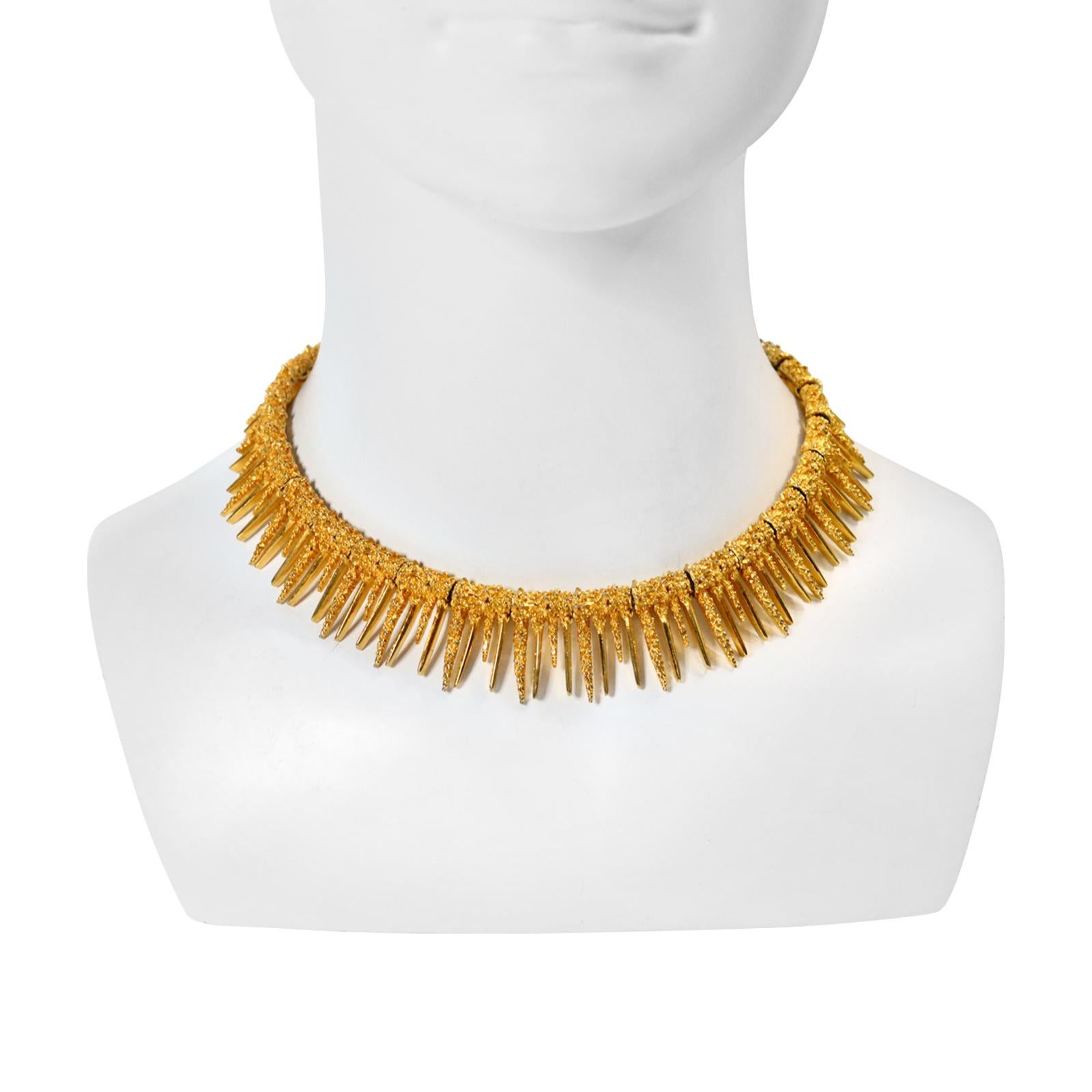 Vintage Boucher Textured Spiky Gold Tone Choker Necklace. The spikes are all at different sizes. Some are textured and some are shiny to add contrast.  There is an extender that is on the necklace. 14