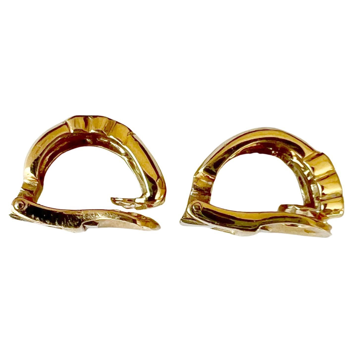 Vintage Boucheron 18K gold and diamond small hoop earrings, circa 1960's.  Earrings measure 5.8