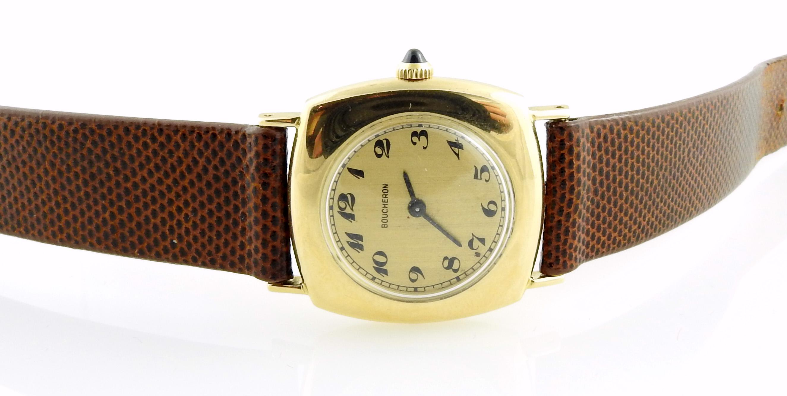 Vintage Boucheron 18K Yellow Gold Ladies Watch #80122

18K yellow gold square case with rounded corners... circular face - case has a slight nic on opposite side of crown as shown in pictures

Gold dial with black Arabic markers - case is approx.