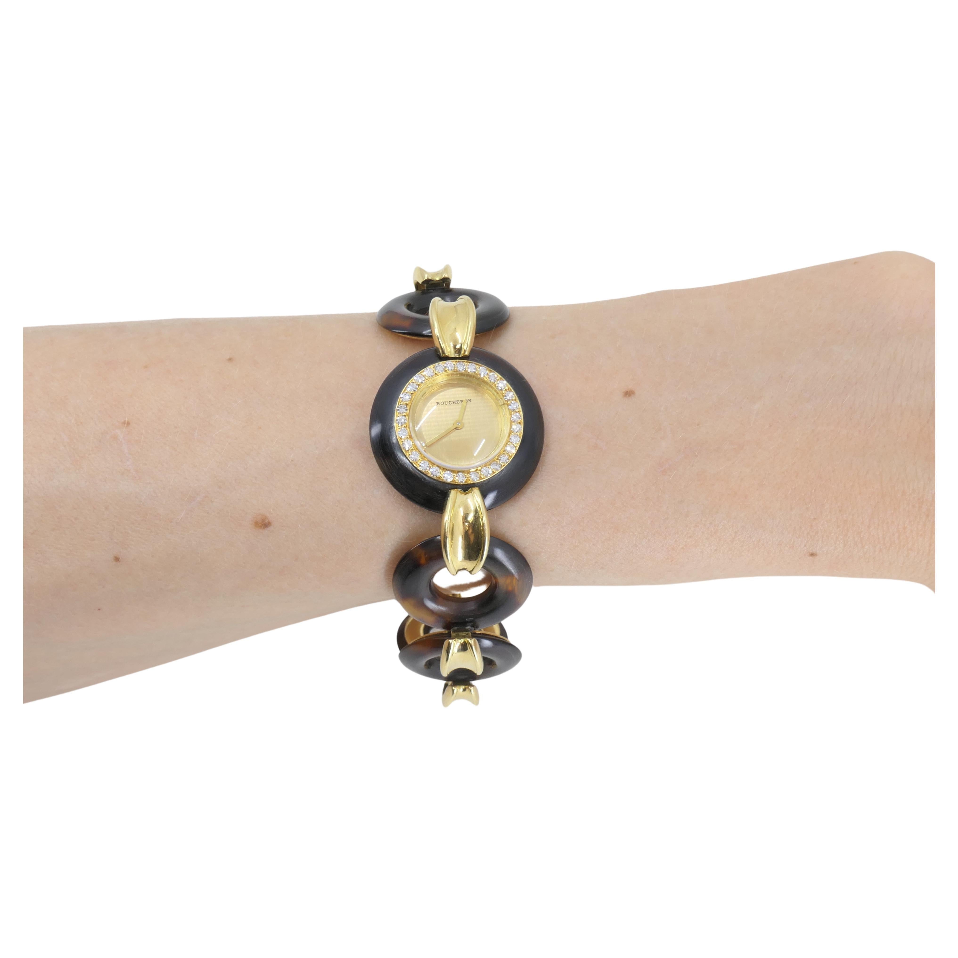 A rare vintage watch by Boucheron crafted of 18k gold, featuring diamonds. The case and bracelet's links are circular shape, with the gold elliptical connectors in between. The case is embellished with pave diamonds. The face is gold, with no