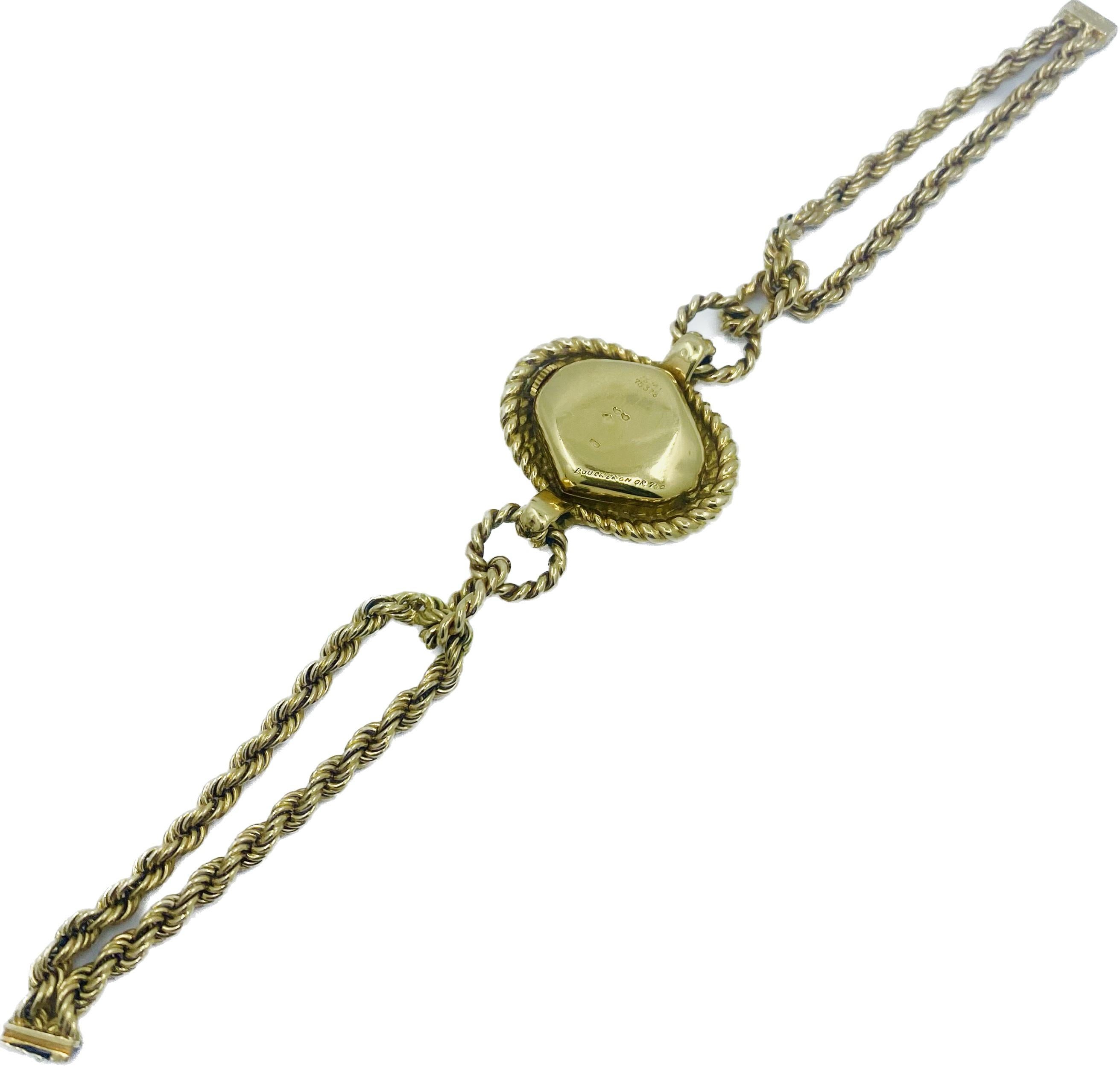 Designer: Boucheron
Materials: 18 karat Yellow Gold 
Weight:  53.1 grams
Measurement: 7