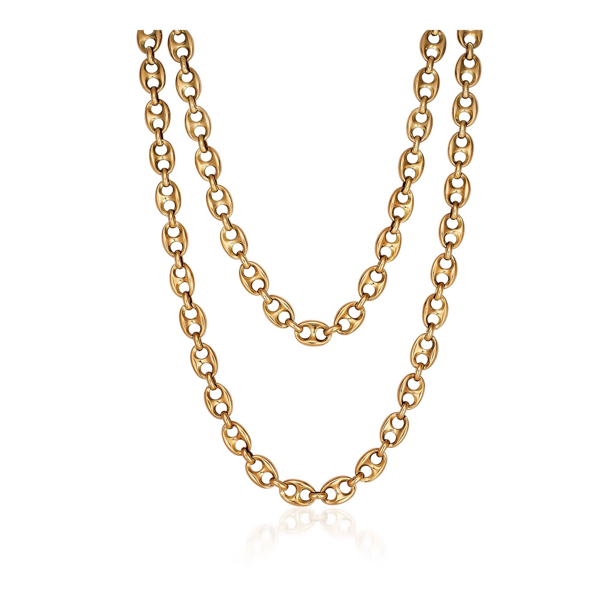 With a timeless but modern style, this vintage Boucheron Paris 18 karat yellow gold solid link chain necklace is as hip as it gets.  At 34