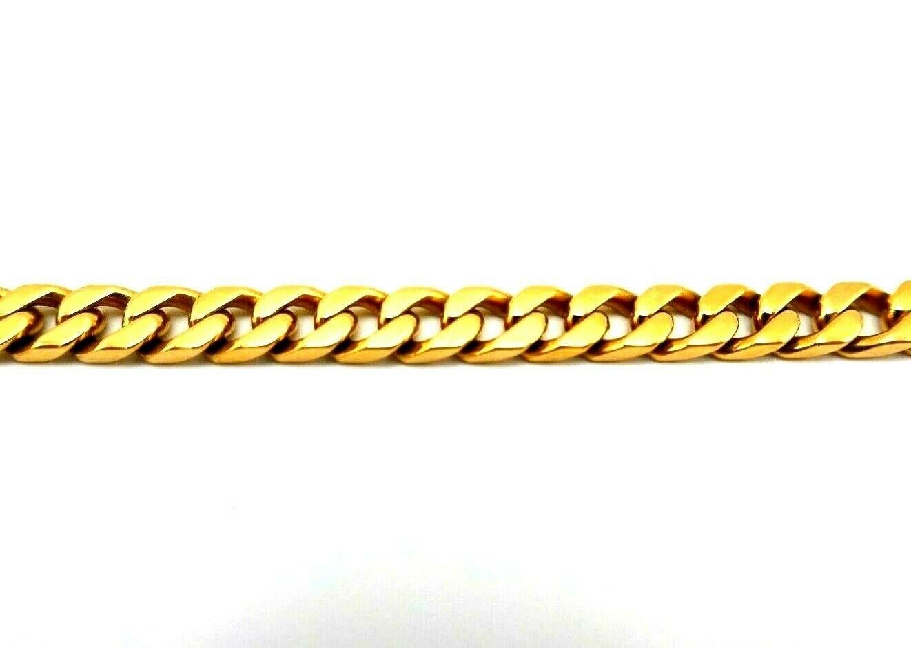 Vintage 18k rose gold cuban link chain bracelet by Boucheron Paris. Stamped with the Boucheron maker's mark, a hallmark for 18k gold and a serial number. 
Measurements: 8