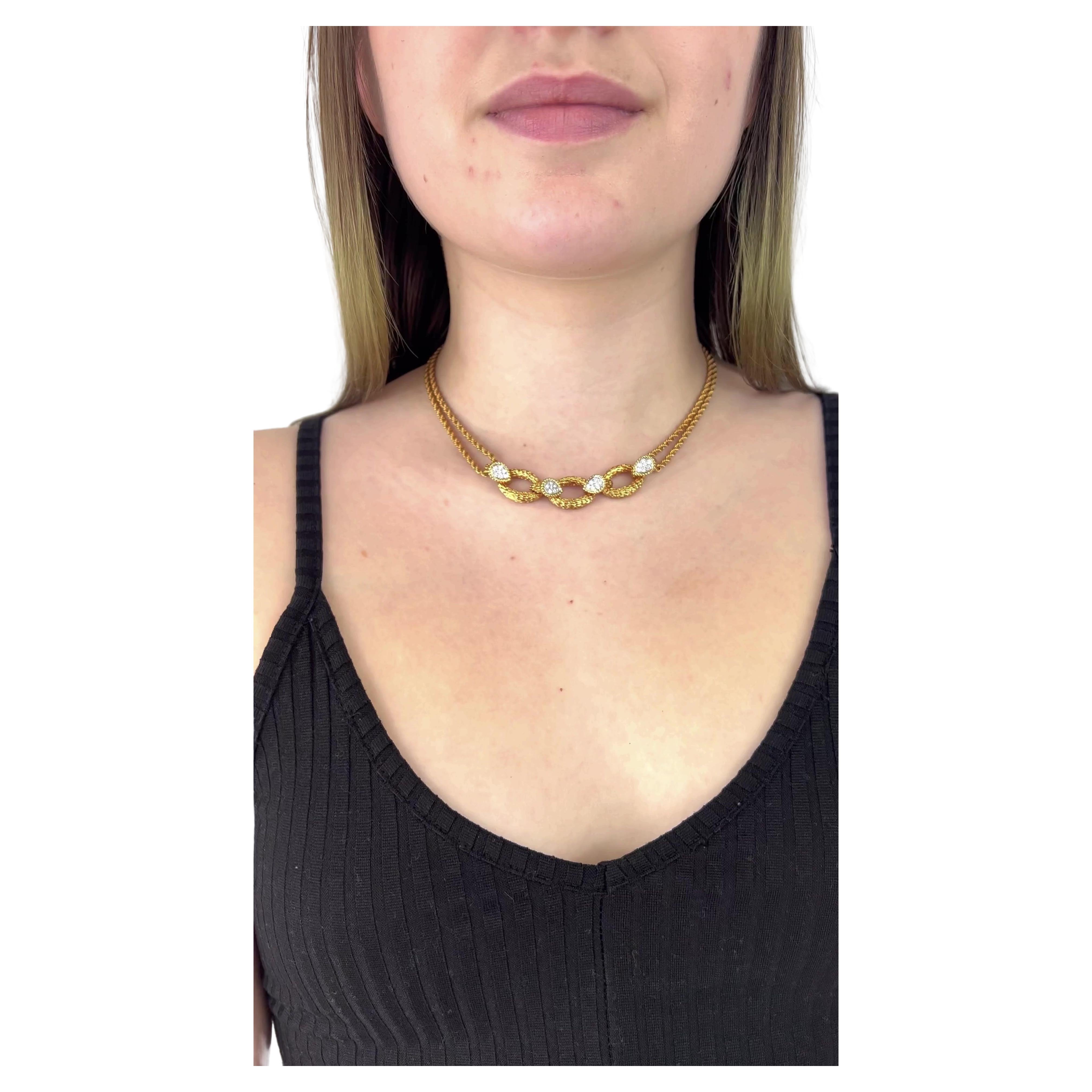 One Vintage Boucheron Serpent Bohème Diamond 18 Karat Gold Necklace. Featuring 28 round brilliant cut diamonds with a total weight of approximately 0.80 carats, graded D-E color, VVS clarity. Crafted in 18 karat yellow gold, signed Boucheron with