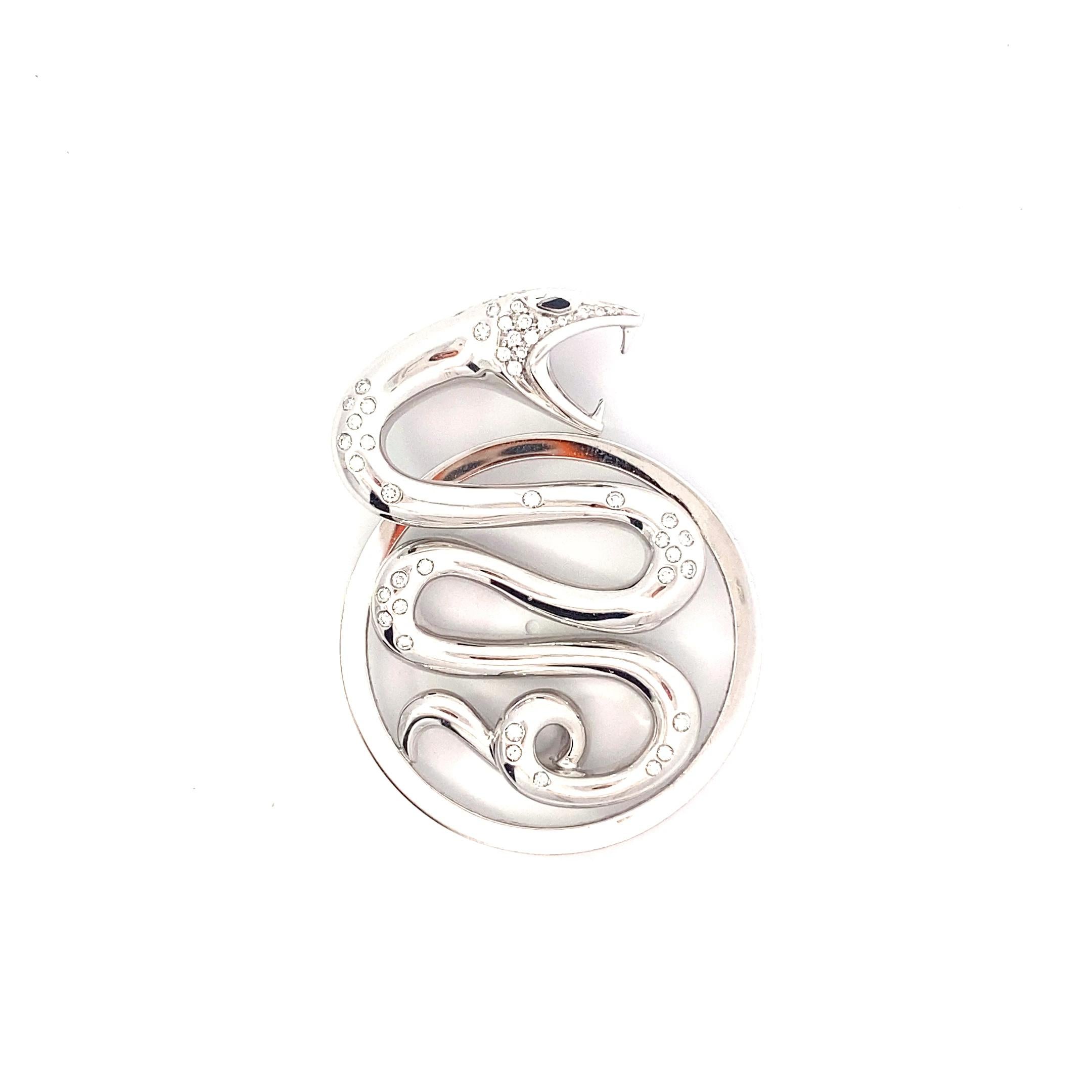 Released as part of the Trouble Collection, this Boucheron 18k white gold diamond detailed snake pendant is an incredible piece that is both fashionable and fire.  Produced in France, this pendant was originally sold on a black leather cord. This