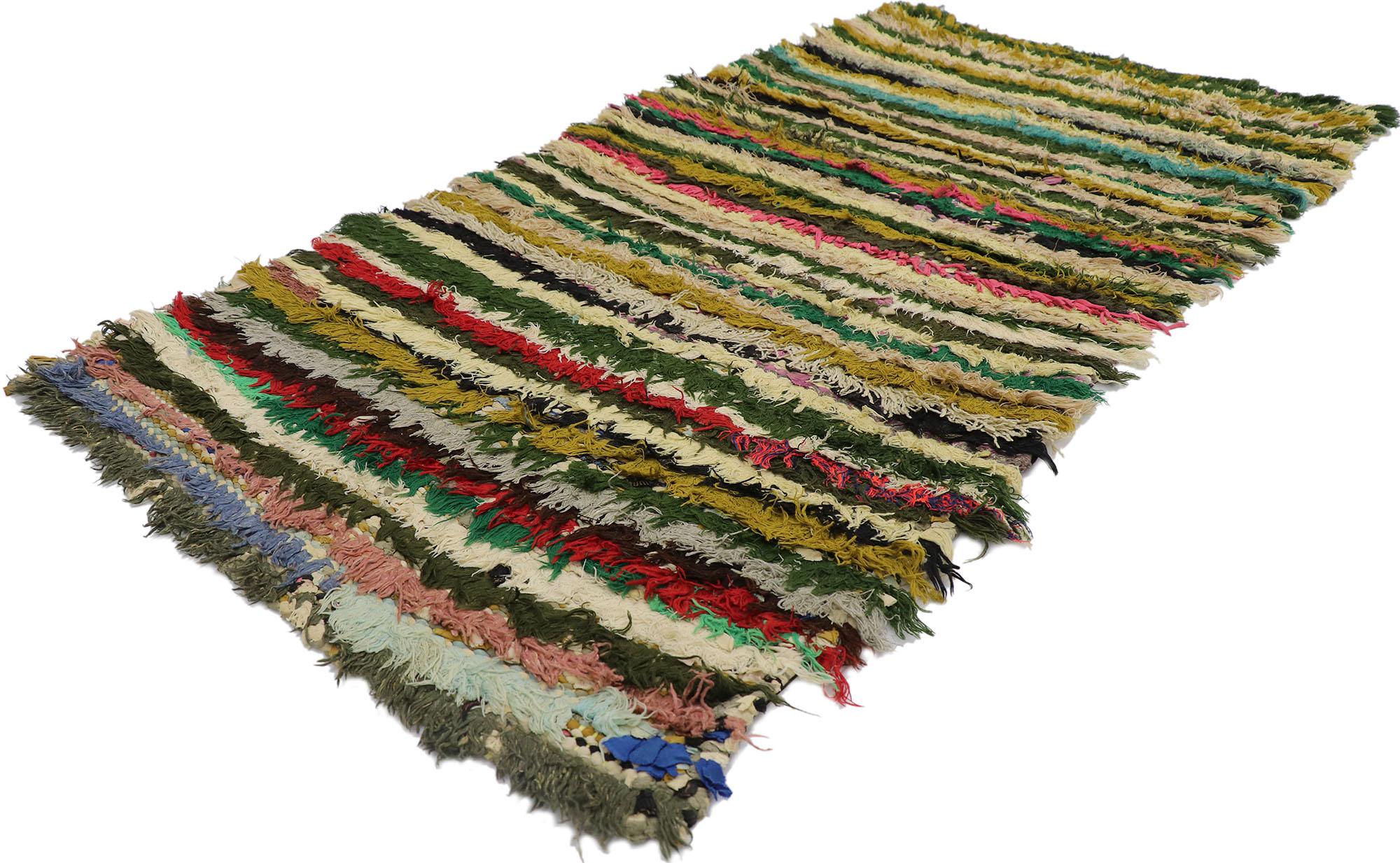 21563 Vintage Boucherouite Moroccan Rug, 02'06 x 05'00.
Nomadic charm meets stylish stripes in this hand knotted vintage Berber Boucherouite Moroccan rag rug. The intrinsic linear design and nature-inspired color palette woven into this piece work