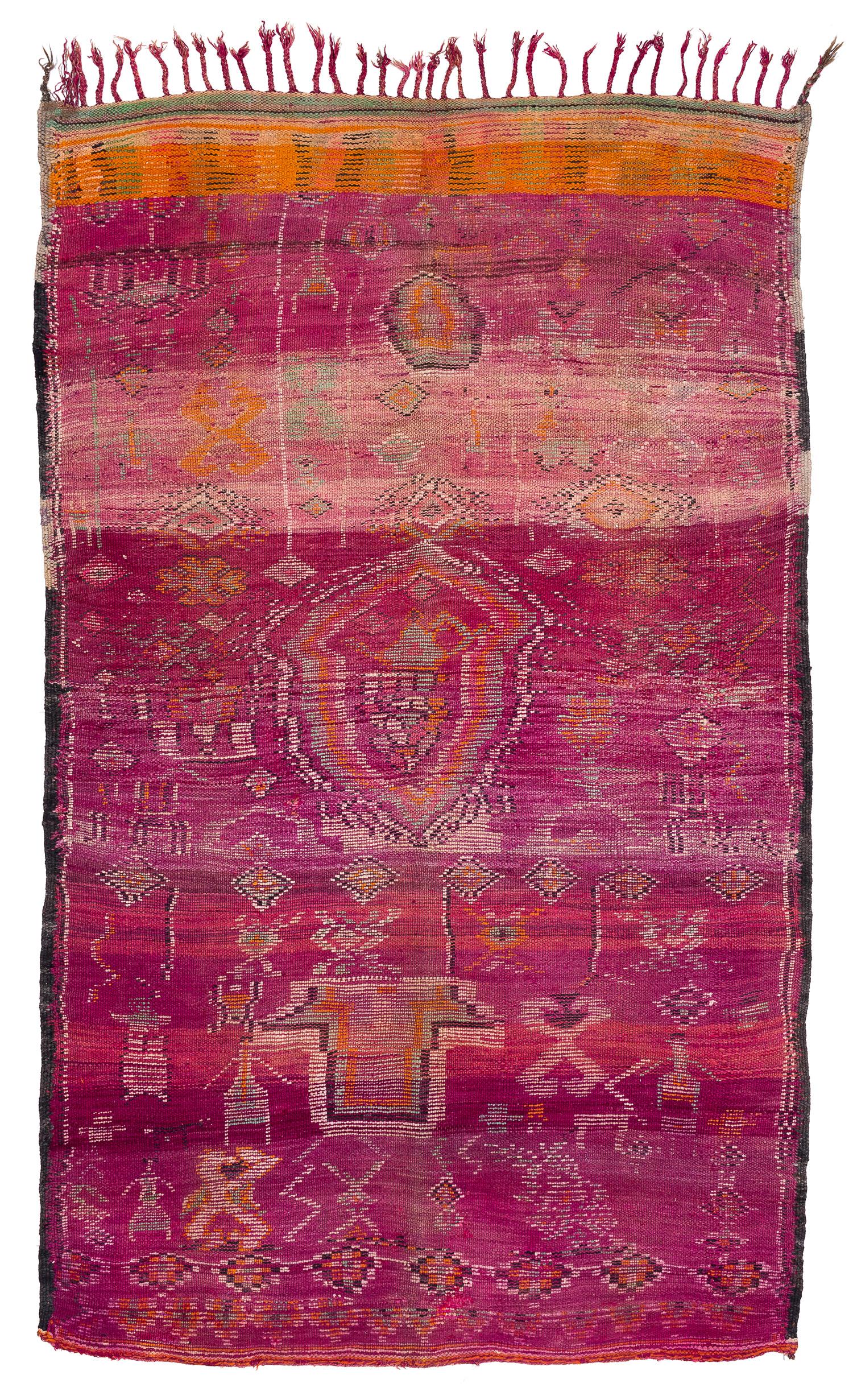 A vintage Boujad Moroccan rug circa 1960. this is an incredible rug woven in beautiful colors. You can see figures of men, women, and animals throughout the design. It is a very desirable rug - a real piece of Folk Art! Measures: 5'1'' x 8'4''.