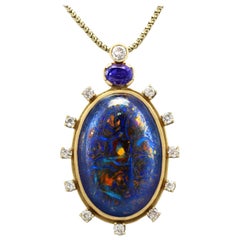 Vintage Boulder Opal, 1.52 Carat Sapphire and 1.28 Carat Diamond Pendant