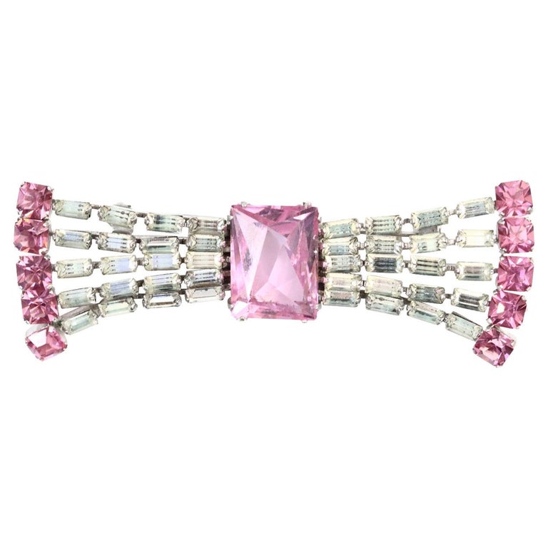 Vintage Bow Brooch with Baguette and Square Pink Stones Circa 1960s For Sale