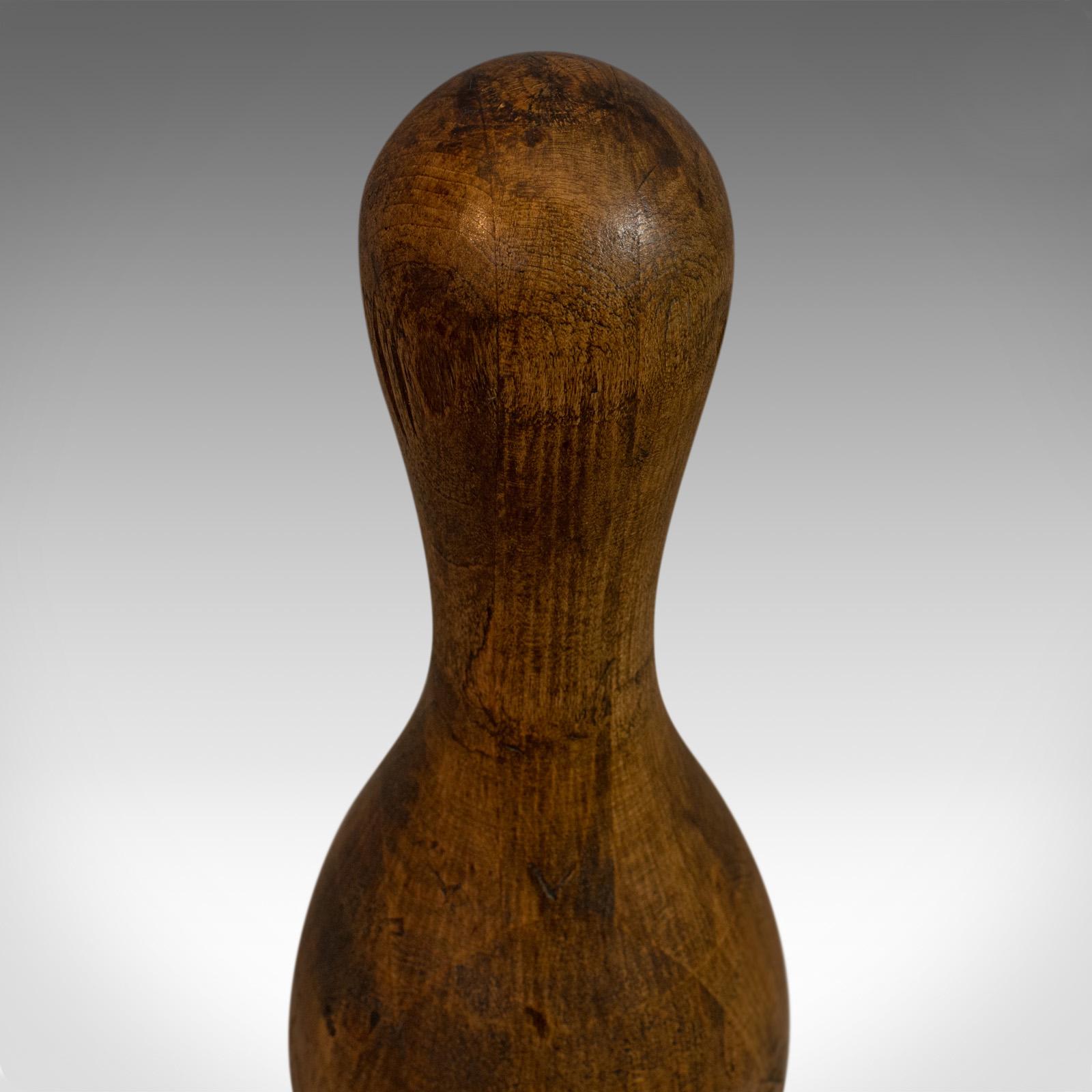 antique wooden bowling pins