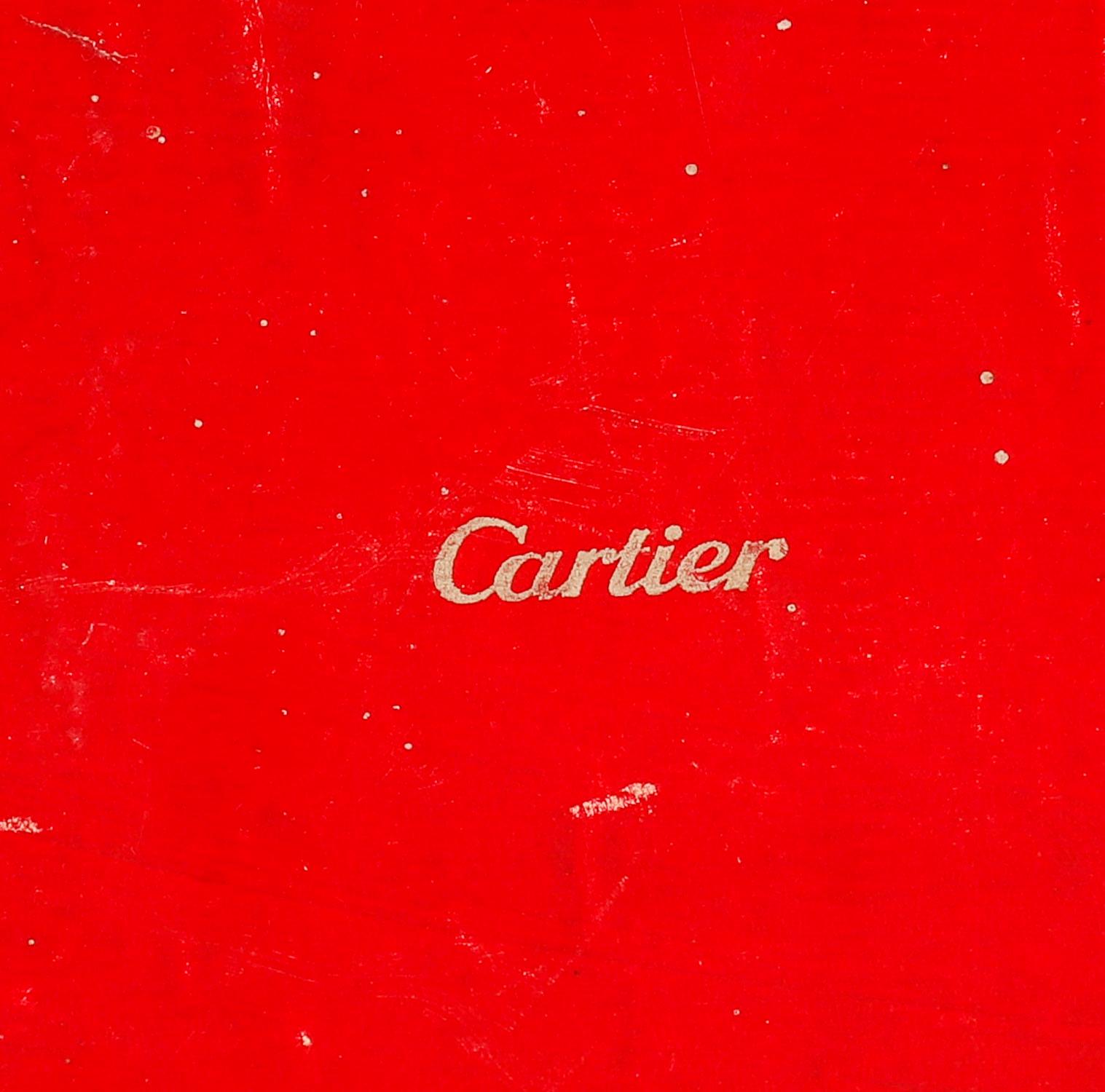An elegant vintage Cartier ice bucket, presented in its original fitted box, complete with sterling silver-gilt ice tongs. This piece was retailed as part of Cartier’s luxury homeware and barware collection during the 1970s–1980s.

The bucket is