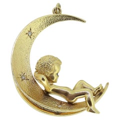 Vintage Boy on the Moon Sapphire and Diamond Crescent Pendant