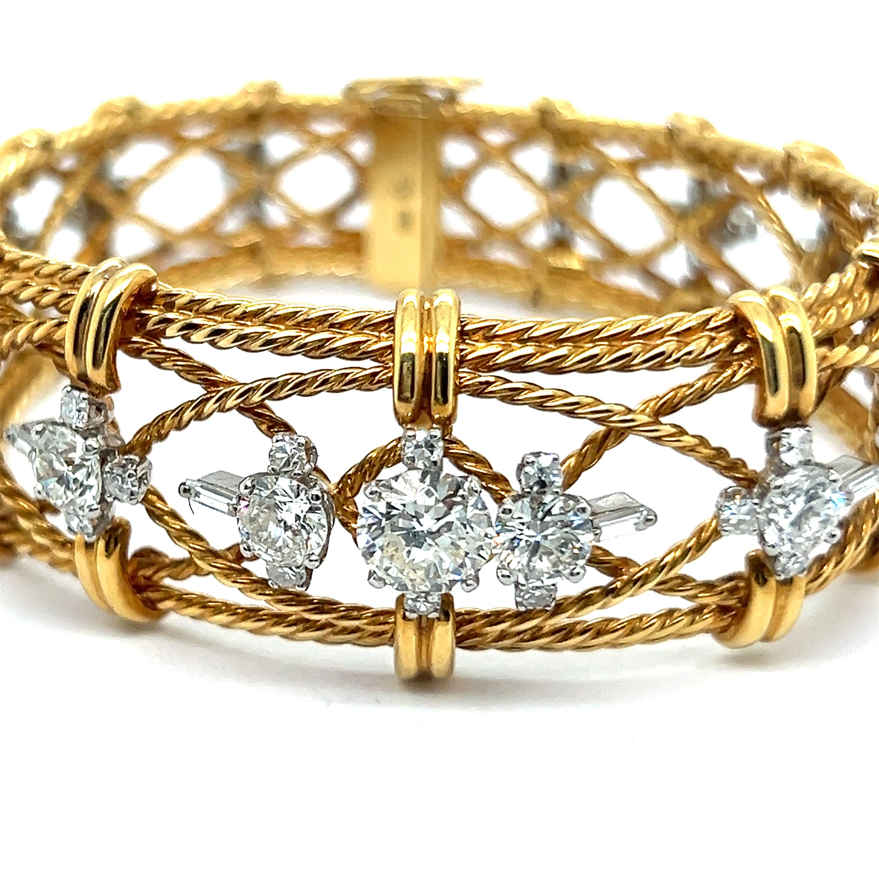 Bracelet with Diamonds in 18 Karat Gold by Gübelin

Embrace the allure of the Gübelin Bracelet, a testament to refined elegance. 

Crafted from 18 Karat yellow gold, its intricate braided frame exudes sophistication. Encrusted with diamonds of