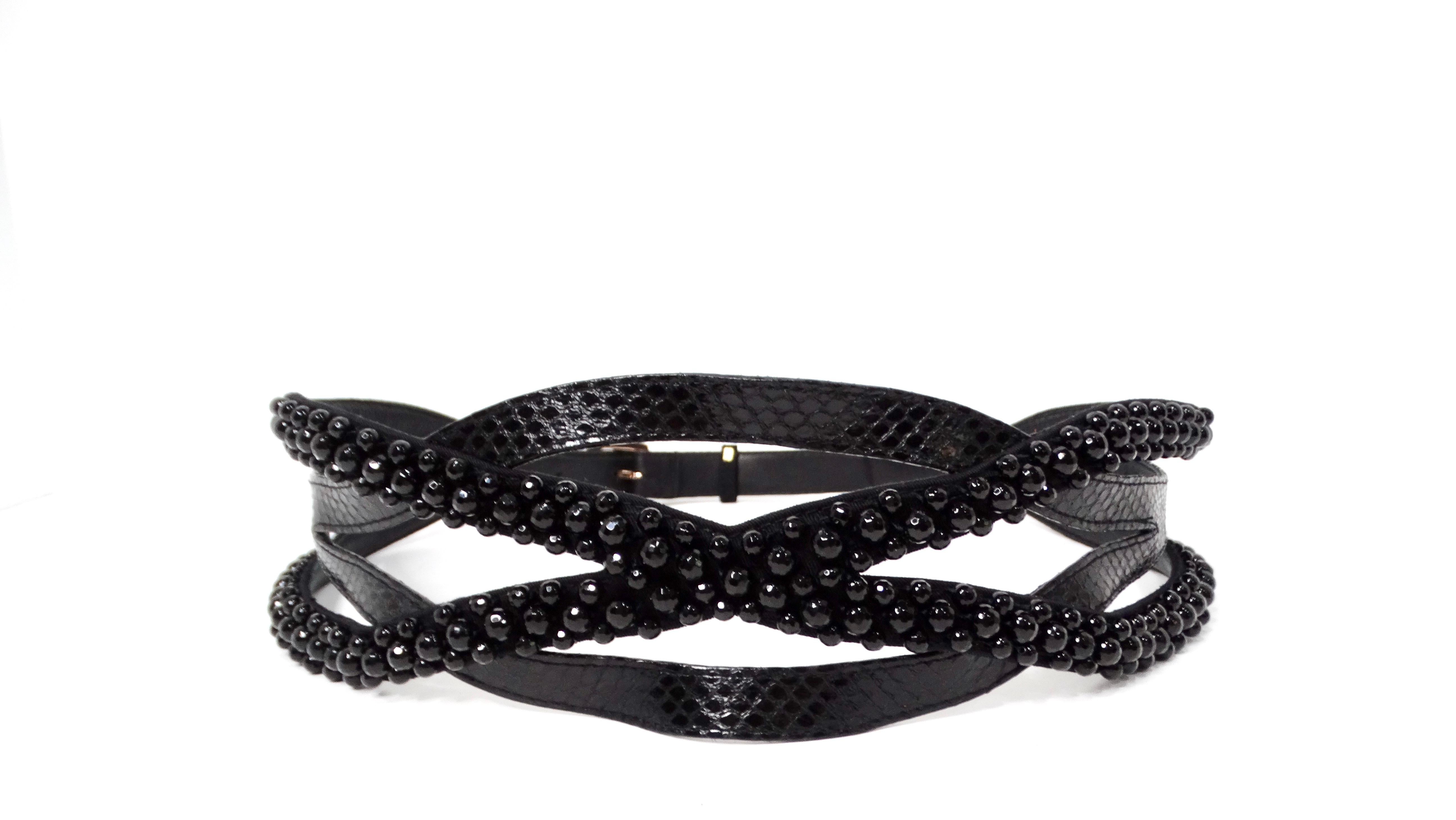 Elevate your wardrobe with this exquisite Vintage Braided Black Leather Waist Belt adorned with captivating beaded detailing. This statement piece is crafted from black leather that exudes timeless elegance, while its unique open braided design adds