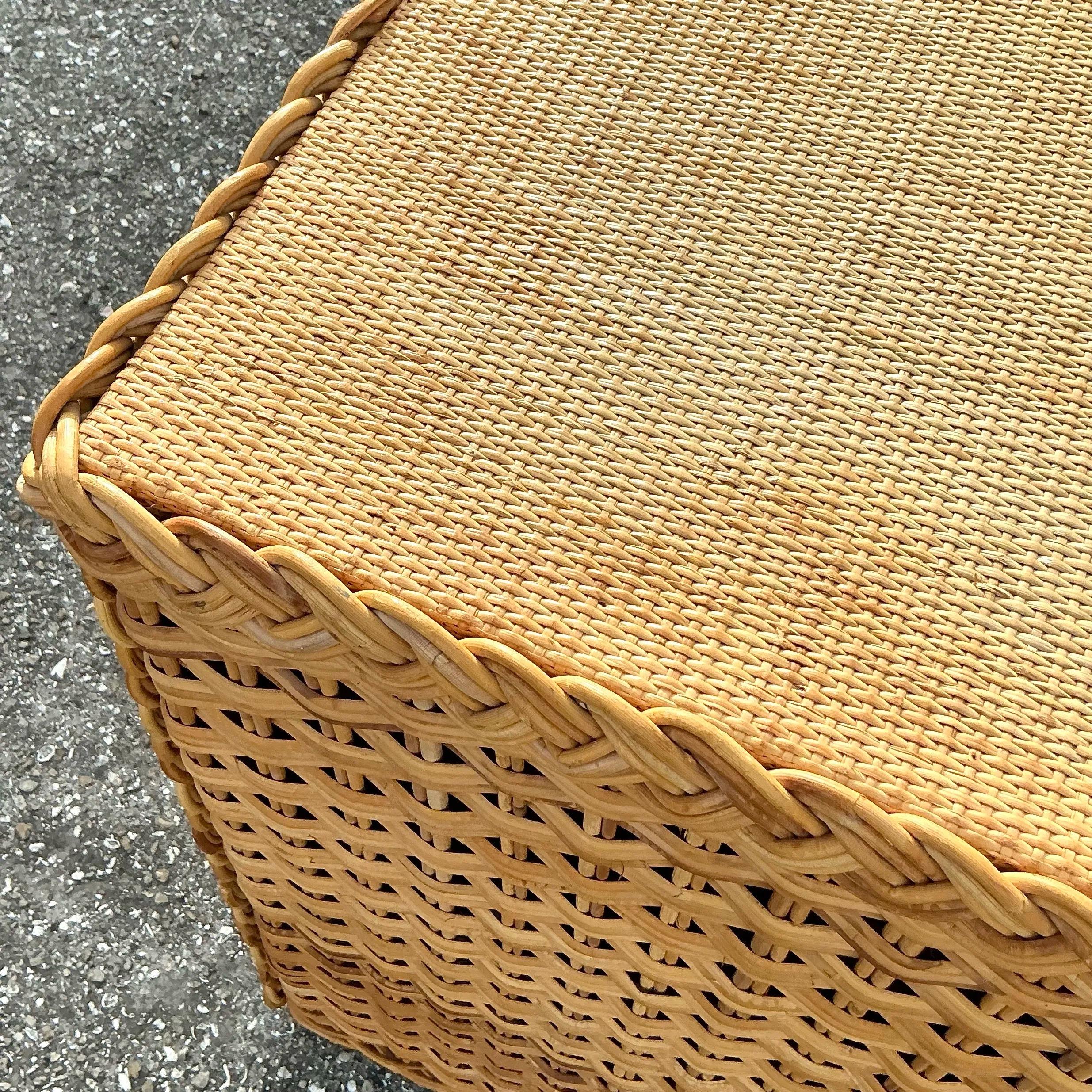 This vintage braided rattan six-drawer dresser is a stunning blend of craftsmanship and timeless design. Its intricate woven detailing and natural finish bring warmth and texture, while the six spacious drawers provide ample storage for clothing,