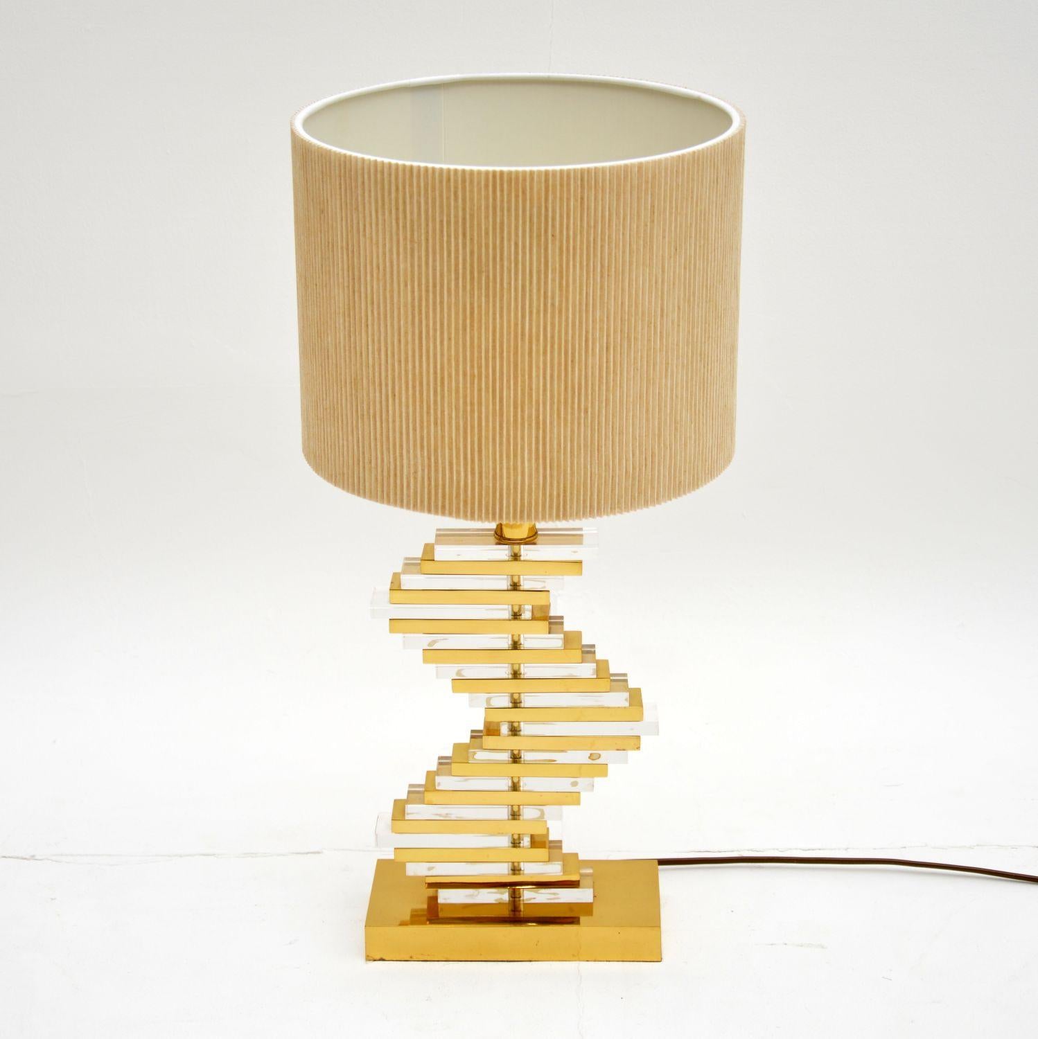 A very stylish vintage table lamp, dating from circa 1980s. This has an interesting stepped design, it’s of great quality.

We have paired this with a lovely modern shade, it has been PAT tested and is in good working order.

  

Measures: