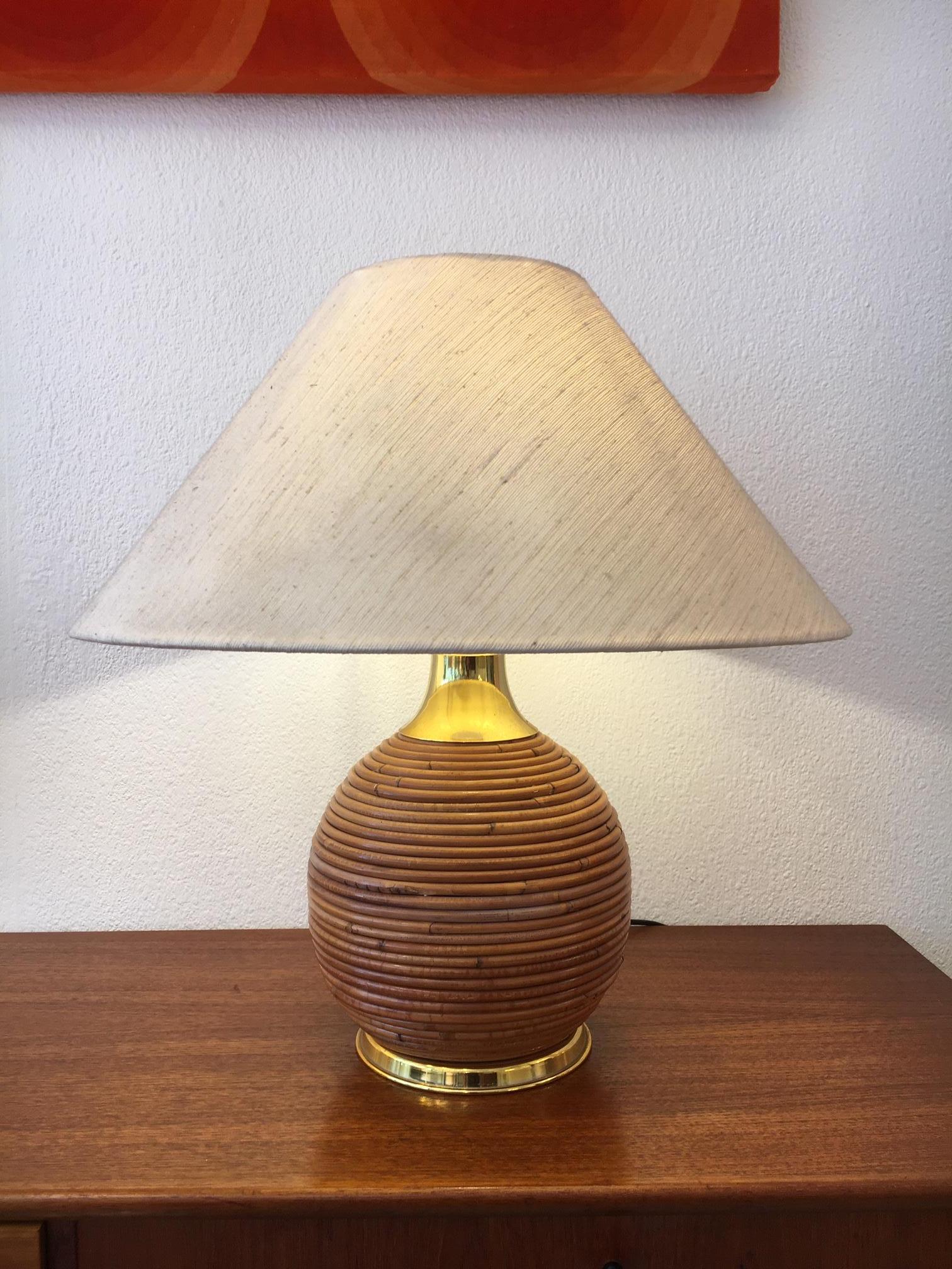 Vintage brass and bamboo table lamp, 1970s
In the manner of Tommaso Barbi creations.