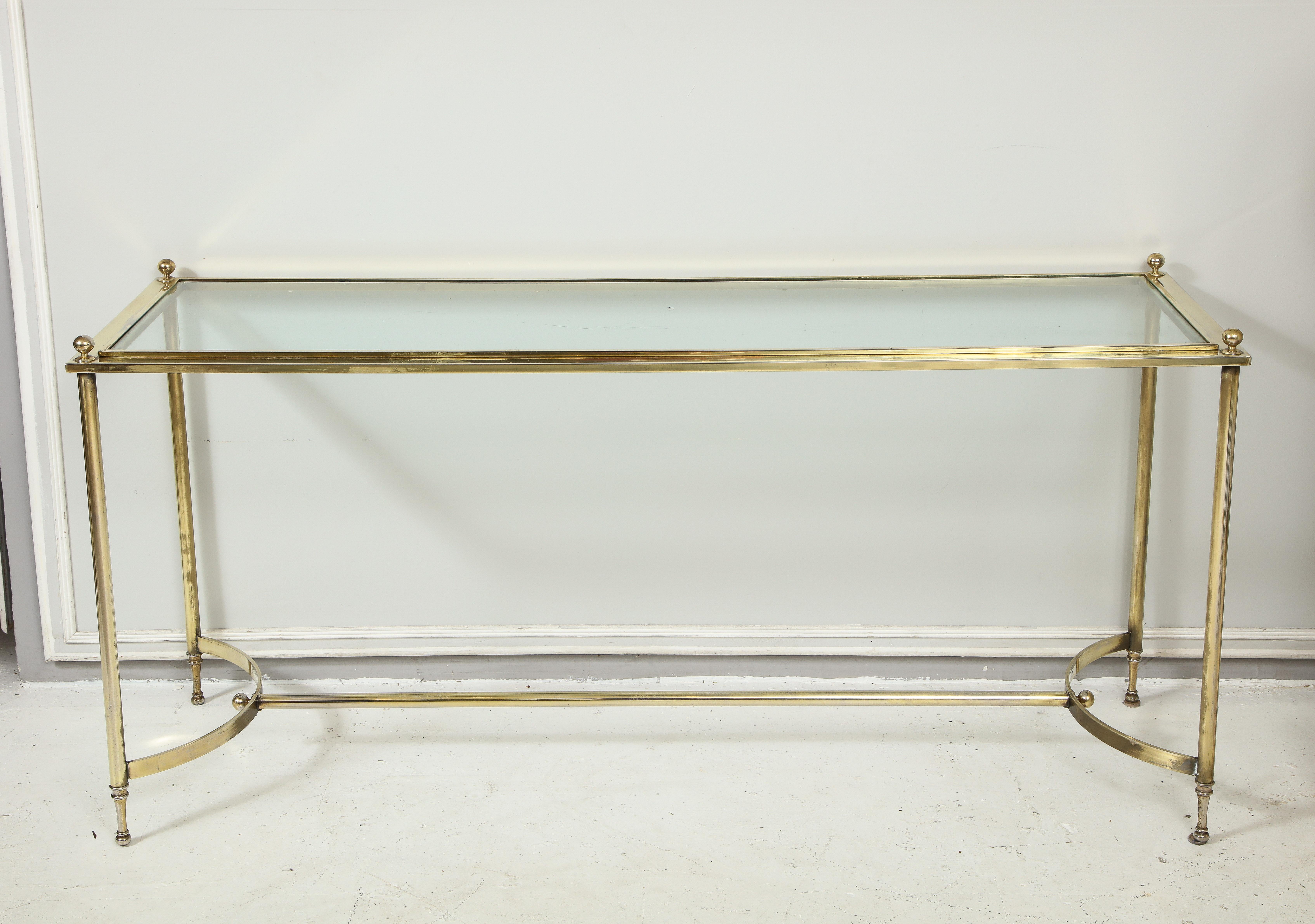 Vintage brass and chrome glass-top console table, body of the console is brass, feet are chrome.