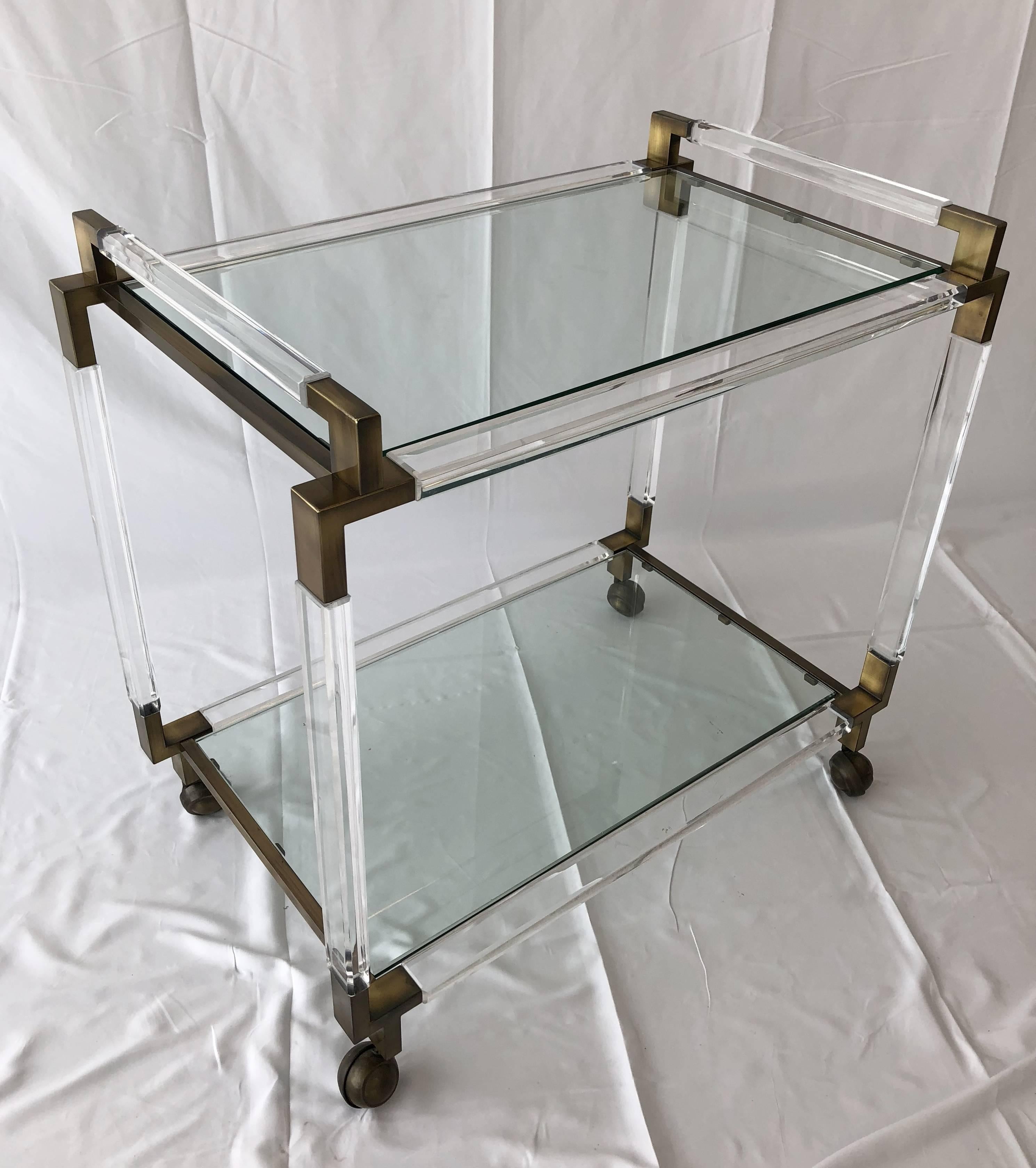 Stunning and beautiful Lucite and brass bar-cart designed and manufactured by Charles Hollis Jones as part of his 