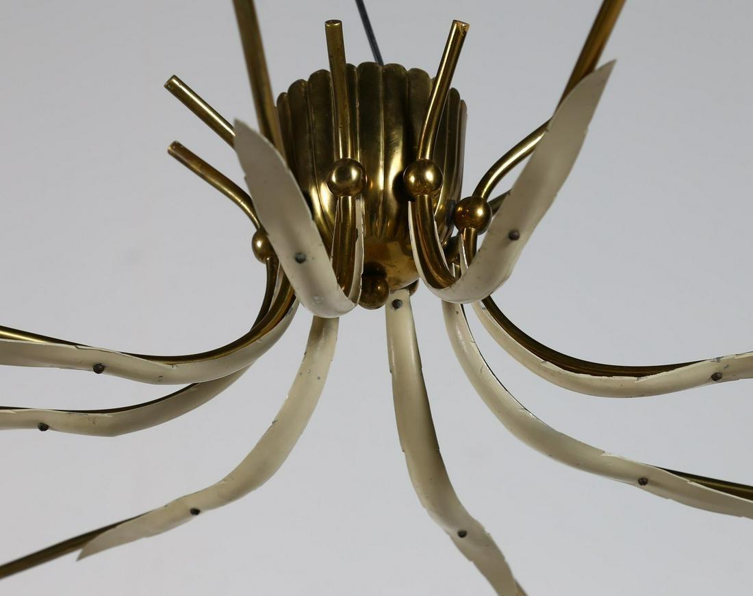 This vintage celling lamp is an original design lamp produced very likely by Lumi in the 1950s.

Elegant midcentury lamp made of brass and varnished aluminium.

Its 8-light diffusers give it a sinuous design. 

Lightbulbs are not