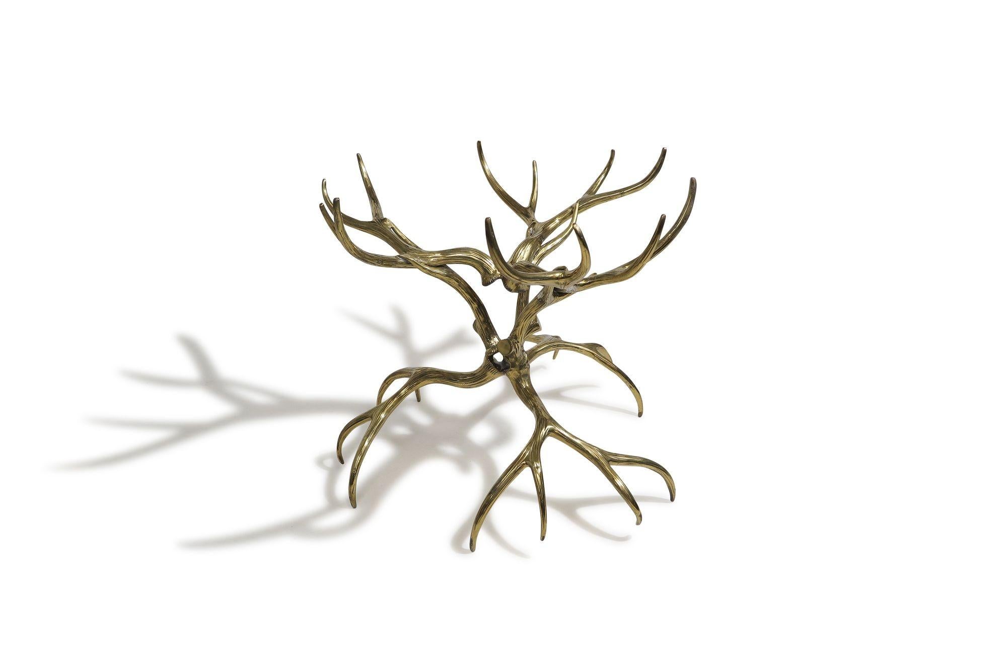 A striking Mid-century table base by Arthur Court, crafted from cast aluminum with a polished brass finish. Designed in the form of buck antlers, this sculptural piece brings bold focal to any space. Its versatile design allows it to serve as a