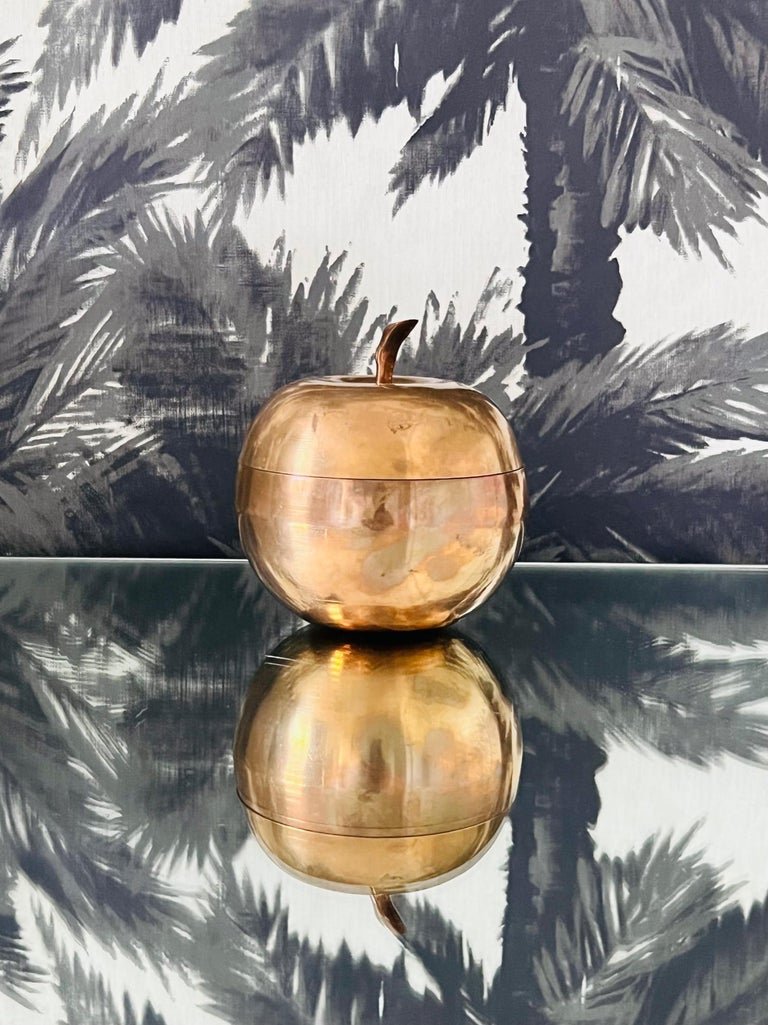 1970's Italian decorative container or box of an apple in patinated brass metal with a lidded top with copper colored undertones. Makes a chic desk accessory or decorative object.