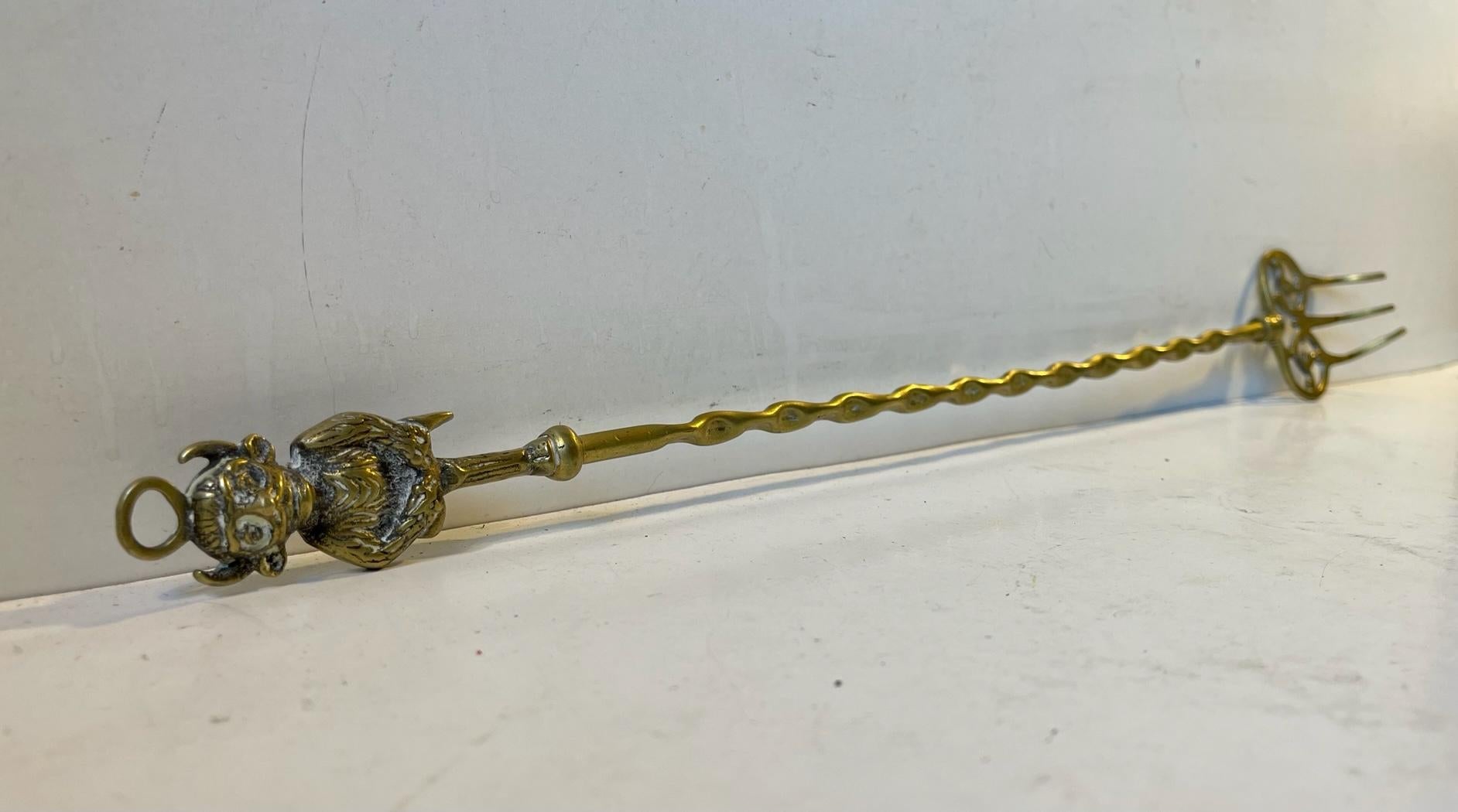 English Vintage Brass Back Scratcher with the Imp / Demon of Lincoln Cathedral
