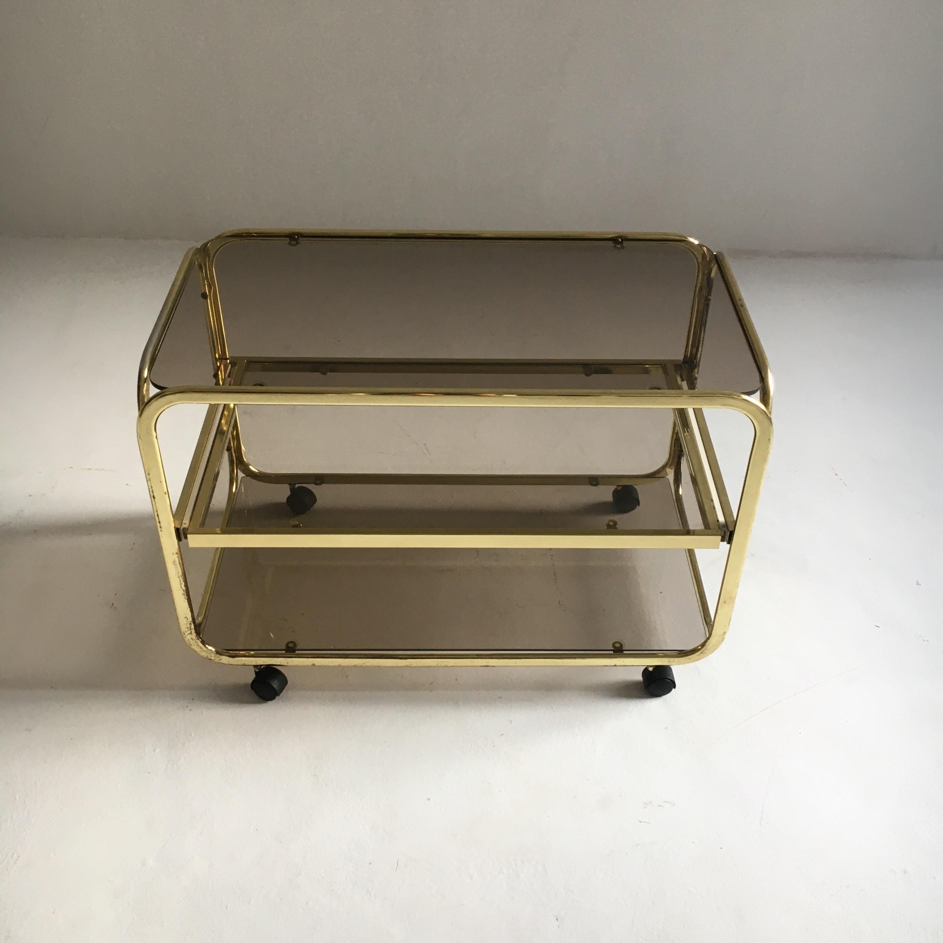Vintage brass plated bar cart table brown smoked glass plates by Morex, 1970s.