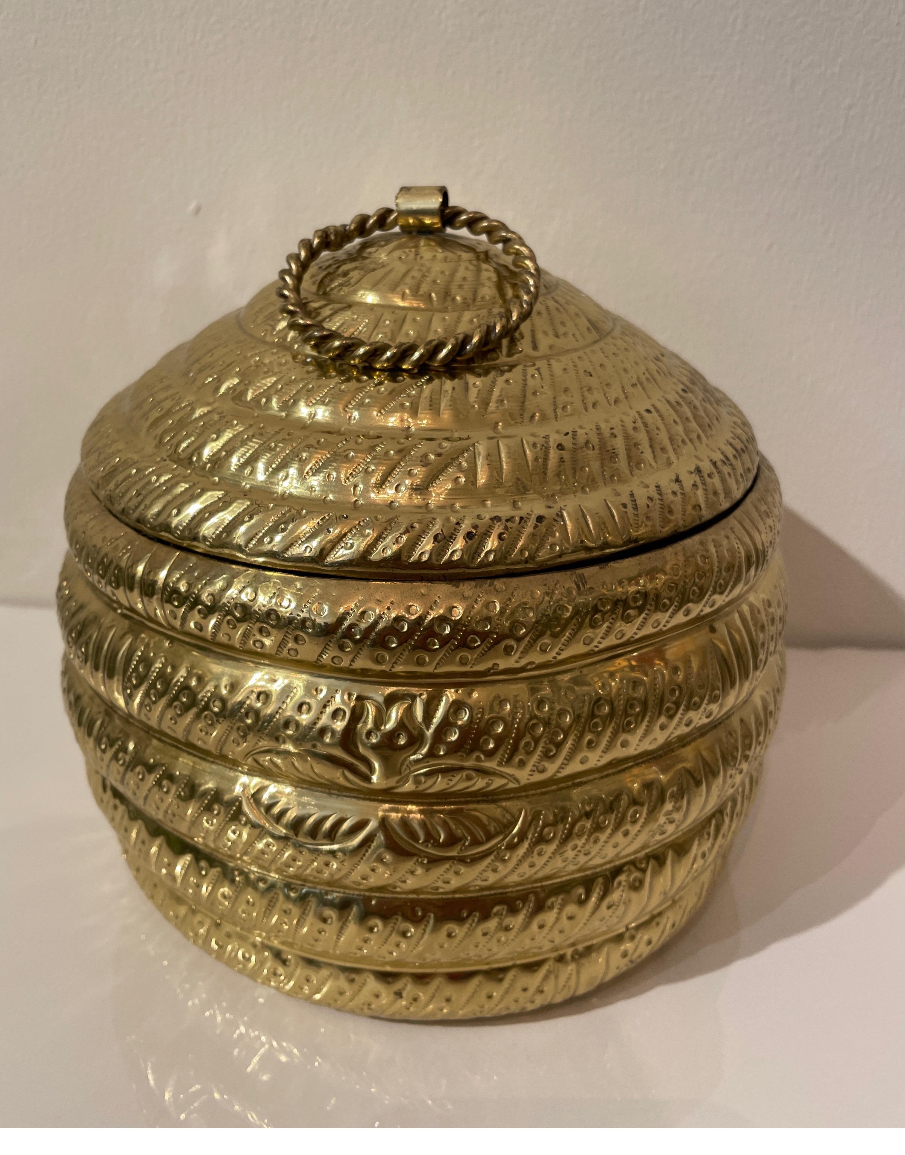 Vintage brass beehive box with lid. This very sweet brass box will make a great accessory in any room. Great for concealing that extra roll of tissue.