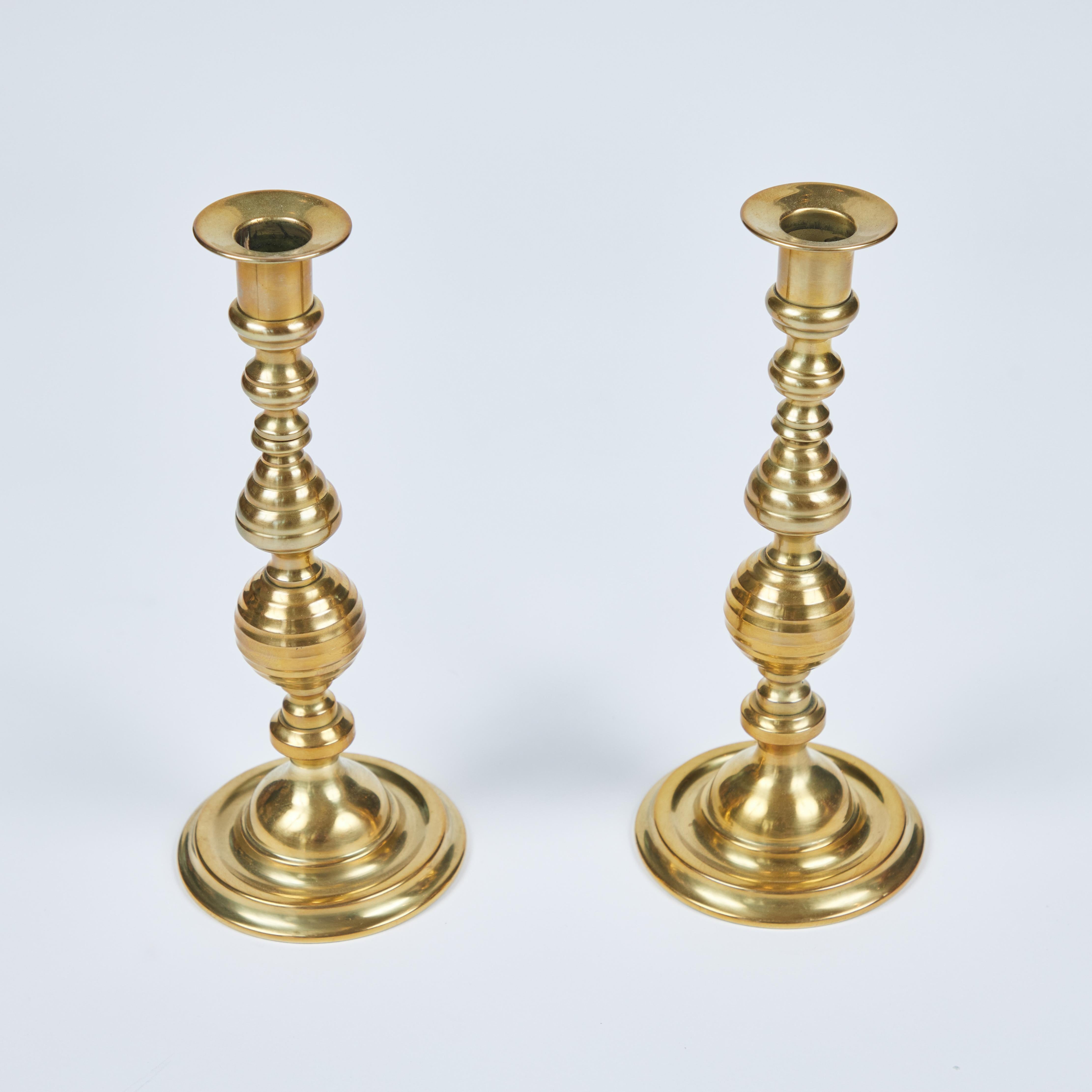 So distinctly classic, these vintage brass 'Beehive' candlesticks from England are lovely. They have a beautiful shapely stem and simple round base, and have been newly polished in a rich satin Flemish finish. This pair would make a lovely statement